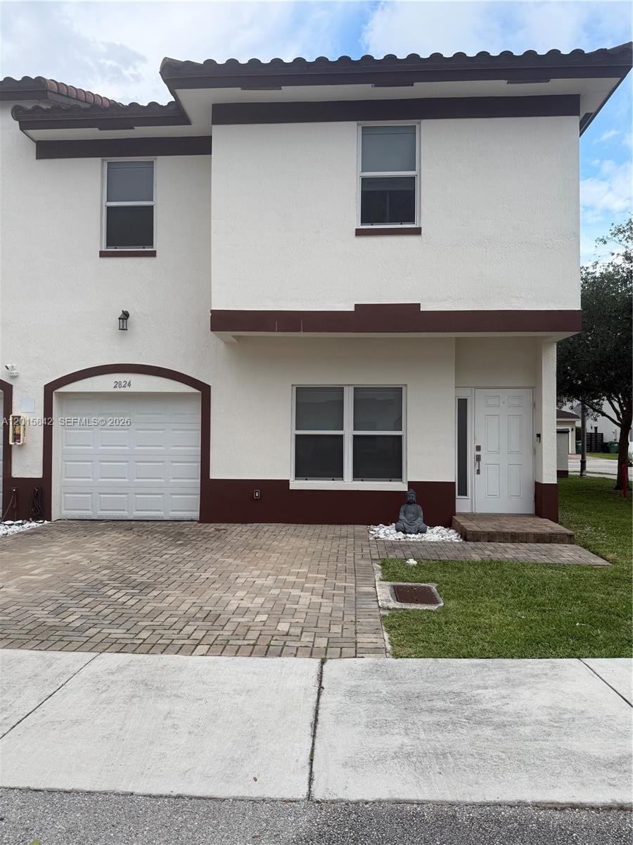 MILLENNIUM TOWNHOMES COND - Residential