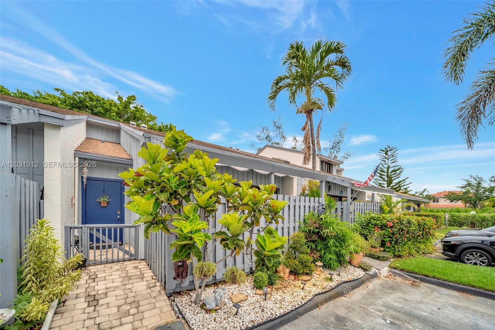 Beautiful 2 bedroom, 2 bath Fully remodeled Townhouse located in the boutique, gated community of Sherbrooke Townhomes, East of US1 in Hollywood. Enter into your foyer area with a separate laundry/storage room. The Living Room/Dining Room area has vaulted ceilings and a full wall of sliders leading to an enclosed front courtyard area. The Hurricane proof skylight bring in lots of additional light. The gorgeous remodeled kitchen has a large granite countertop/breakfast bar area as well as upgraded pendant lighting. Stainless steel appliances including a double oven, French Door Fridge etc. A breakfast nook area is located next to the kitchen with sliders leading to the Fully Screened back patio. Lots of storage throughout including separate pantry cabinets as well as under the stair storage room. Guest bedroom is downstairs with wood laminate flooring, a walk-in closet and a full bath for guests. Walk up the beautiful Bamboo stairs into the extra large Primary Suite, also with bamboo floors. A balcony adds to this beautiful set-up. The Primary bath has a dual vanity as well as a walk-in shower. The large walk-in closet is amazing. The roof was installed in 2018 & the exterior of the buildings were recently painted. A new fence is being installed and there is a gated entry with security cameras. The community is financially solid and there are no upcoming assessments. Located about a mile from the beach, you will love living in this community! Seller might need post occupancy