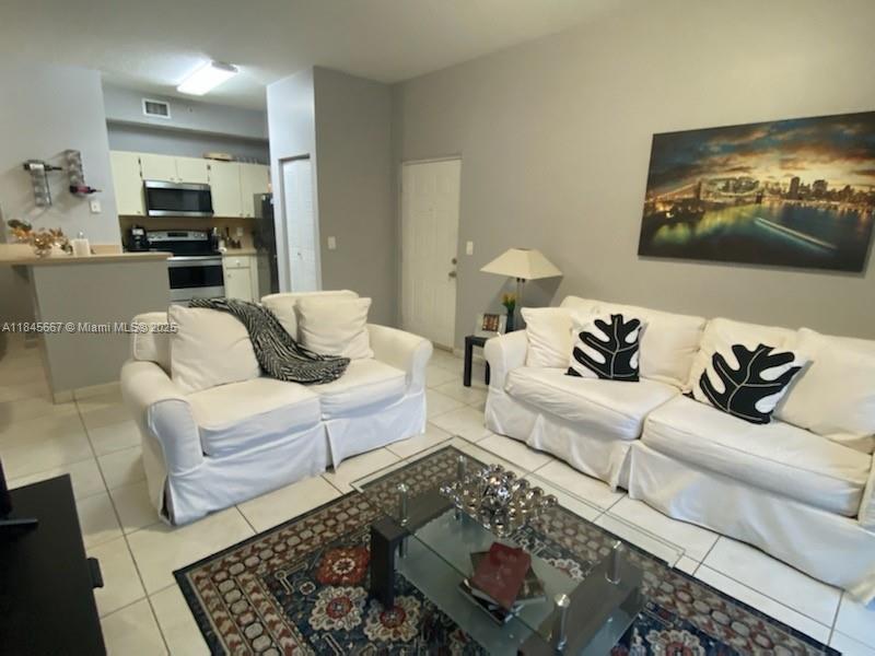 DEEPLY DISCOUNTED FIRST MONTH'S RENT, ONLY $2000. TWO ASSIGNED PARKING SPACES in front of the building, no worries about finding an available parking space. 
MOVE -IN WITH FIRST MONTH'S RENT AND SECURITY DEPOSIT ONLY!!
NEW SS APPLIANCES. 
The 2b/2b ground floor apartment is located in a luxurious gated community Palm Gardens at Doral, with clubhouse, swimming pool and GYM. It has hurricane impact doors and windows. Close to major highways, close to the best A+ elementary, middle and high schools. Minutes away from renowned Doral Malls. Best deal in Doral!!