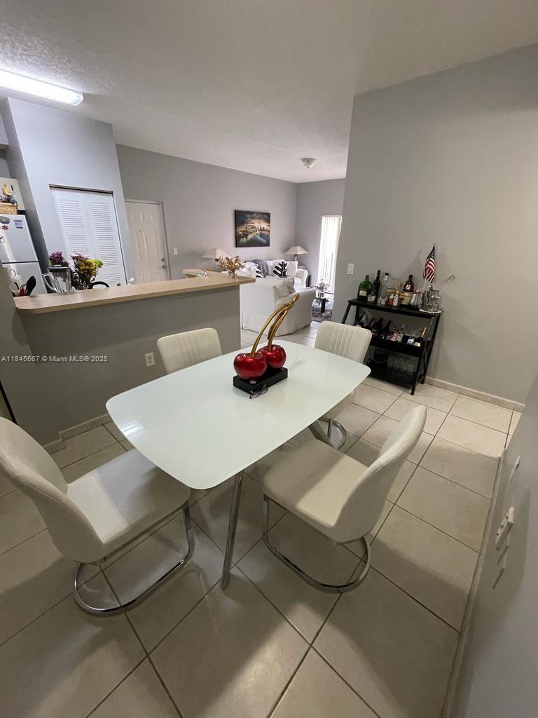 PALM GARDENS AT DORAL CON - Residential Lease