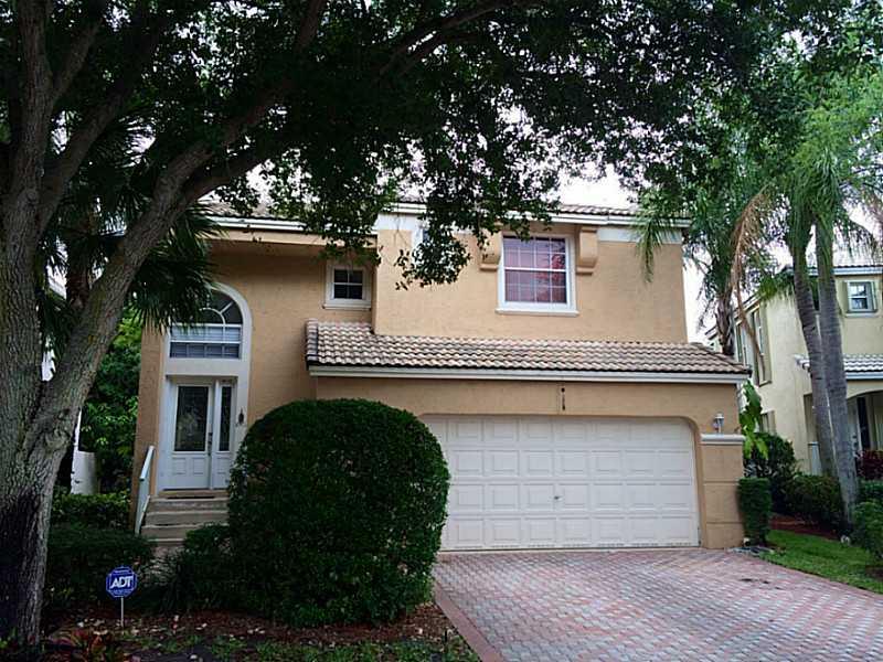 Meticulously maintained & beautifully updated home in the heart of Coral Springs w 2 car garage w laundry area! The location provides easy access to the Sawgrass. The home is a short drive from the beach!  The kitchen features newer stainless steel applia nces, dark hardwood cabinetry & granite countertops. Open floor plan w 2 spacious living areas & formal dining room. The community pool allows residents to stay cool during those warm summer days while not having to worry about the maintenance.