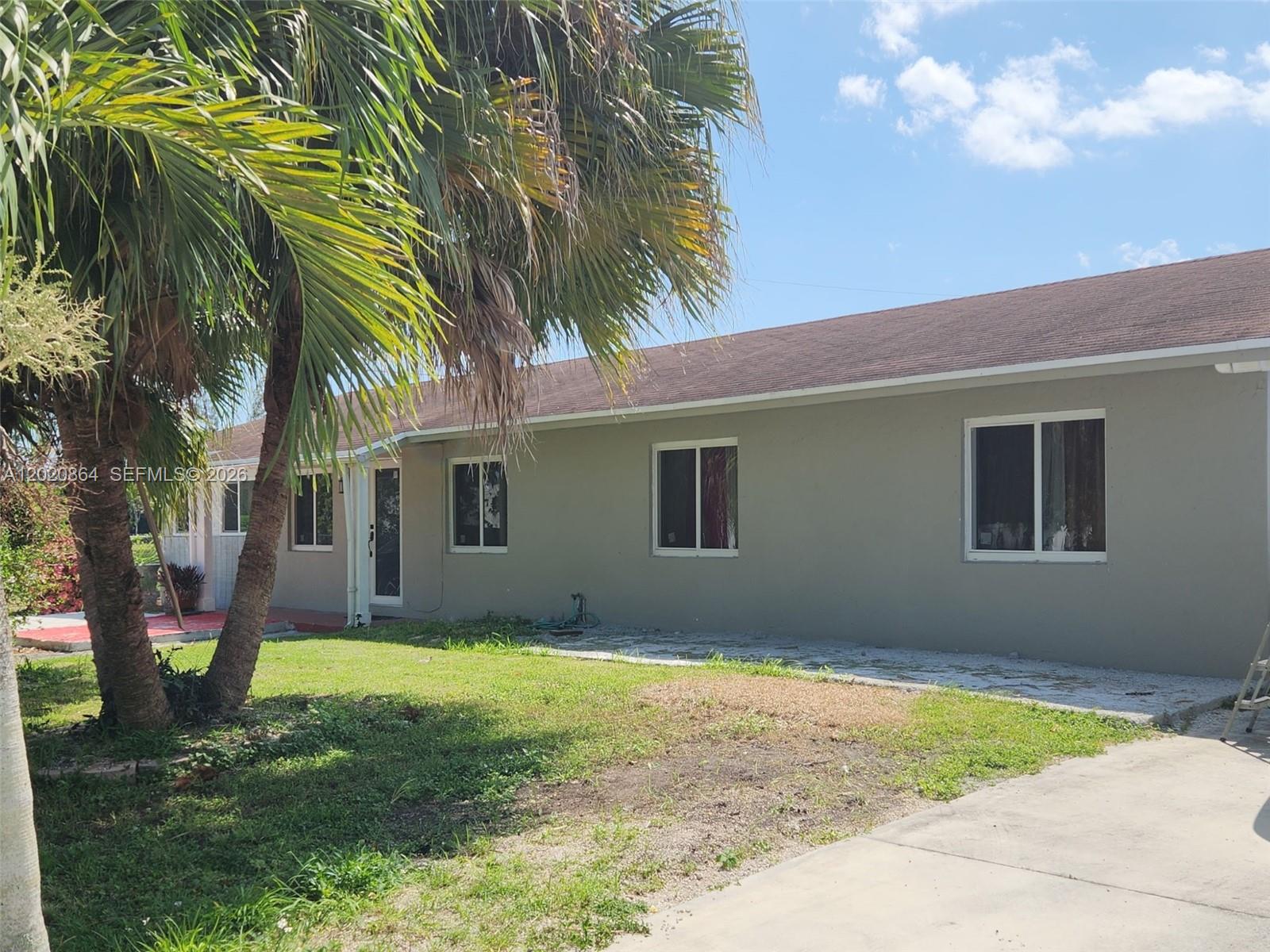 4 Bedroom 2 Bathroom Single Family Home with no HOA!! Extra room could potential be a 5th bedroom or an office/playroom. Home features tile through out, granite counter top with wood cabinets. Stainless steel appliances. New impact windows & doors.New A/C. Property is fully fenced with room for boat and rv! Fruit trees. Corner Lot right next to William J minutes Park. Beautiful views of the lake right from your home. Close to shopping centers and only 30 minutes away from the Florida Keys & 18 minutes from Flamingo National park!