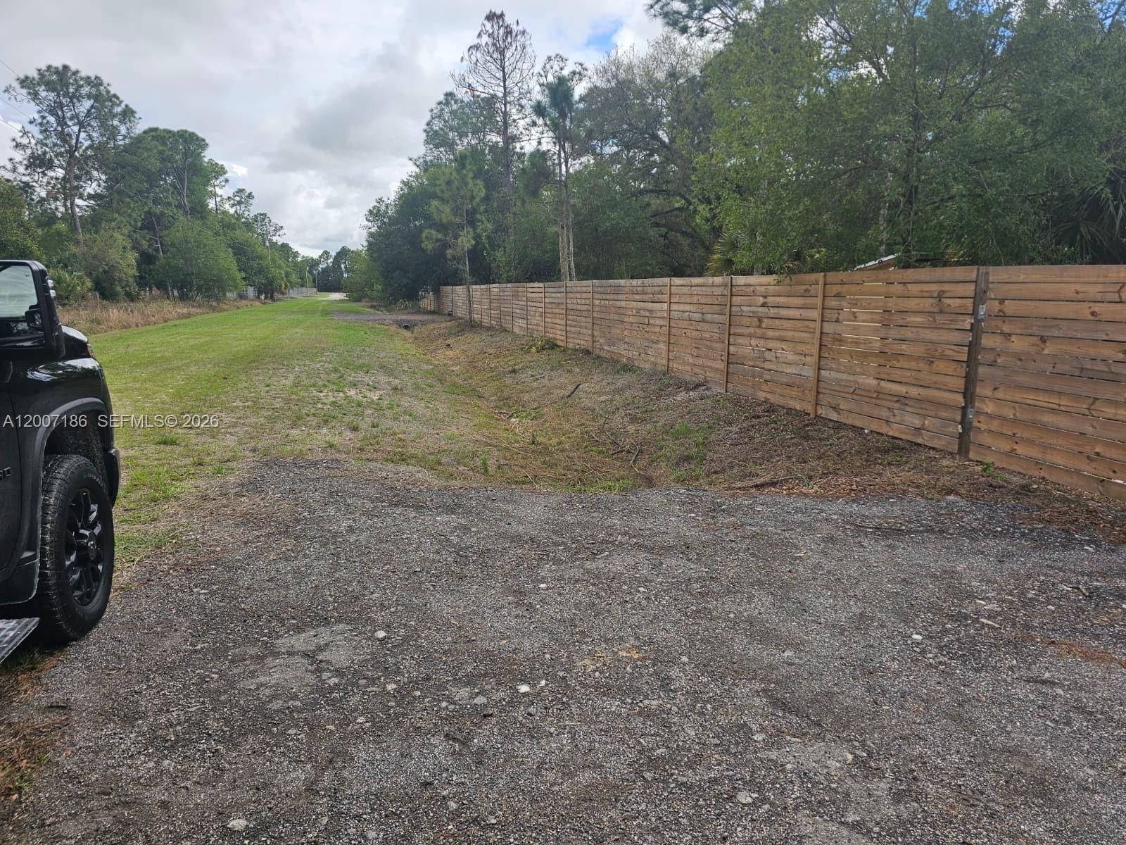 Rare opportunity to own TWO side-by-side lots in Montura Ranch Estates, offering added space, flexibility, and immediate usability. Both properties are partially fenced, featuring a beautifully finished wooden front fence that creates a charming ranch-style setting.
The property is already equipped with a working water well, protected by a small structure, along with installed driveway entrances (culverts) completed in accordance with county requirements—saving you time and upfront costs.
Additional improvements include a storage shed and an outdoor kitchen area, making it ideal for RV use, weekend getaways, or enjoying the property right away while planning your future build. Solar lights have been installed throughout the property, enhancing both ambiance and functionality.
Per the available survey, the lots are not identified as wetlands, offering excellent usability and making future development more straightforward. This is a great opportunity to build, invest, or create your own private rural retreat.