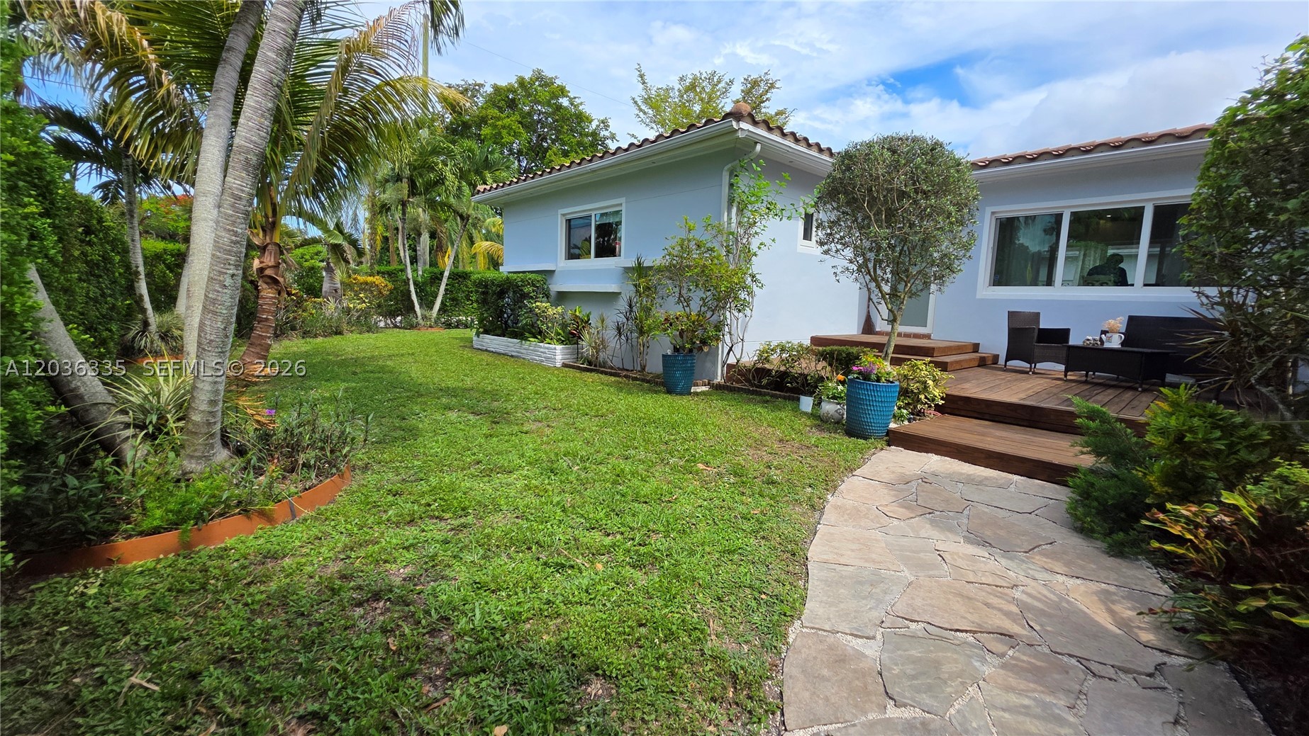 Tropical Oasis on an Oversized Corner Lot in Griffing Biscayne Park Estates! Rare opportunity to lease a charming 3-bedroom, 2-bath single-story home situated on a fully fenced 11,625 SF corner lot in one of North Miami's most desirable residential neighborhoods. This unique property offers approximately 1,640 sqft of living area, a spacious driveway that accommodates up to 4 vehicles (one inside the garage). The true highlight is the spectacular tropical backyard featuring mature fruit trees, lush landscaping, ambient lighting, a gazebo, multiple outdoor entertaining areas, and a private entrance, creating the perfect setting for relaxing, entertaining, or enjoying South Florida living year-round, and plenty of room for boat storage. Conveniently located just minutes from I-95, US-1, Miami Shores, Biscayne Park, shopping, dining, and schools. A rare combination of privacy, outdoor space, convenience, and character that is difficult to find in today's rental market. Lawn maintenance is included in the rent. Available on August 1st, 2026. Friendly note: A well-known neighborhood outdoor cat ("Minina") has been part of the property surroundings for many years and is often seen enjoying the backyard. Prospective tenants should be comfortable sharing the outdoor space with her.