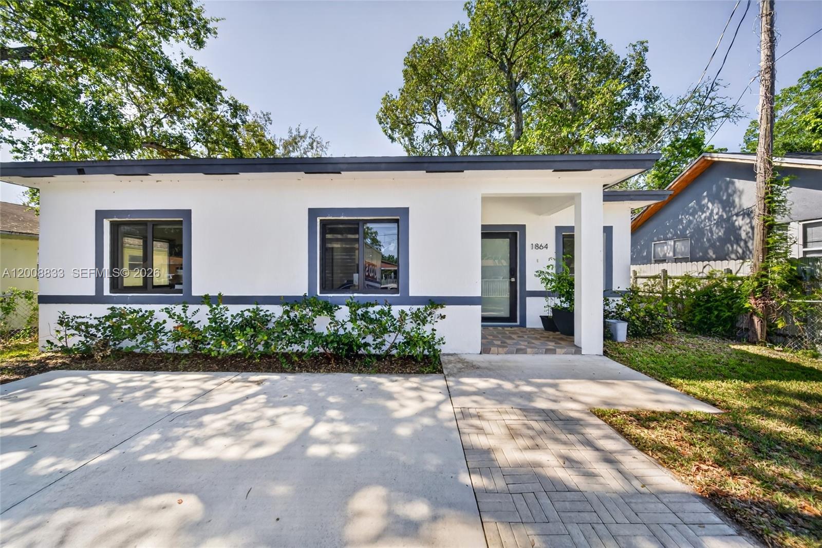 Newly built and meticulously maintained by its original owner, this stunning 4-bedroom, 2-bathroom home offers modern luxury at an exceptional value. Featuring a bright open-concept layout, sleek tile flooring, and a designer kitchen with white cabinetry, stainless steel appliances, and a spacious island perfect for entertaining.

Generously sized bedrooms provide comfort and flexibility, making it ideal for first-time buyers, while its turnkey condition and contemporary finishes present a strong opportunity for investors. A rare find that blends style, convenience, and long-term value.