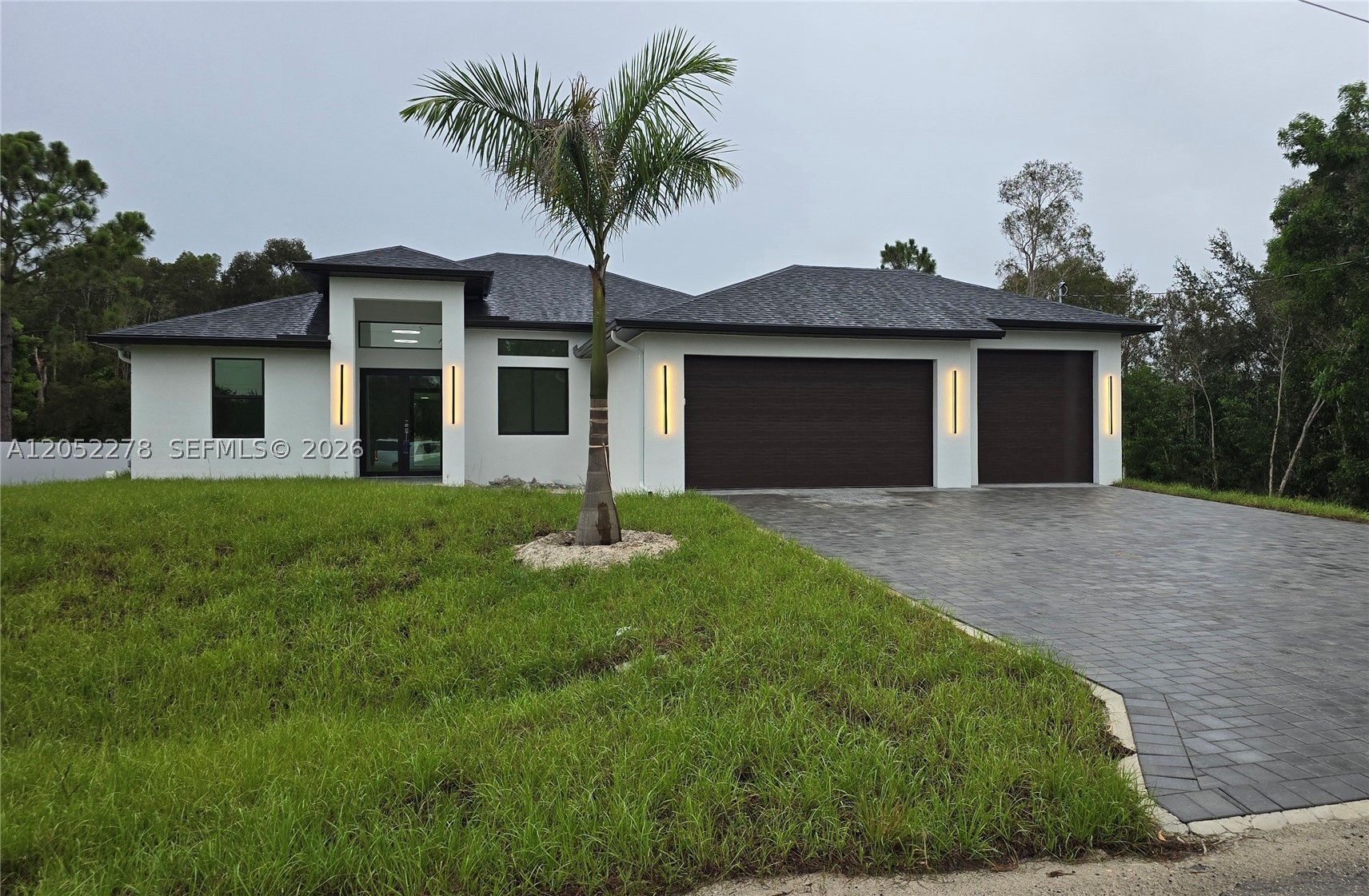 NO HOA - NO FLOODZONE - NO ASSOCIATION - 4BR/3bath/3CAR with Drive-thru 3rd CAR for additional hidden parking / storage on side behind 3rd garage.  3rd FULL Bath off HUGE Lanai & 2nd MBR. HUGE 37 x 10 LANAI has Summer Kitchen w/ Sink.  90 x 125 OVERSIZED LOT backs up to beautiful canal.  Near I82/Parkdale/Homestead/Jaguar. Still Time to Make Selections. OPEN CONCEPT FLOORPLAN with Large Island Kitchen.  Gorgeous Finishes throughout.  FULL Tile Floors and Shower/Tub Walls w/ Crack Isolation membrane.  Premium 42" cabinets & Quartz Tops.   Kwikset Signature door handles.  Moen Plumbing Fixtures.  Openers w/ wifi.  Premium GE Appliances.  Our Properly Compacted Fill Soil Foundation is the only proven technique to eliminate Structural Cracks and Settling failures. QUALITY MATERIALS AND INSTALLATIONS offered by Award Winning Builder for over 40 years from the Midwest.  
  The BEST Designs, Floorplans & Quality!  HURRICANE CONSTRUCTION w/ IMPACT WINDOWS & DOORS. TITAN 160mph SHINGLES, STEEL REINFORCED CONCRETE BLOCK,
AFFORDABLE AWARD WINNING DESIGNS! ……..A Better Way To Live……..Designed For Life……..AFFORDABLE BEAUTIFUL MODERN HOMES. WHY SETTLE FOR LESS ?  Do NOT SETTLE for OTHER Houses  That WILL SETTLE.  
Builder has Other Plans in Other Locations UNDER CONSTRUCTION NOW.  $10,000 Concessions toward Closing.