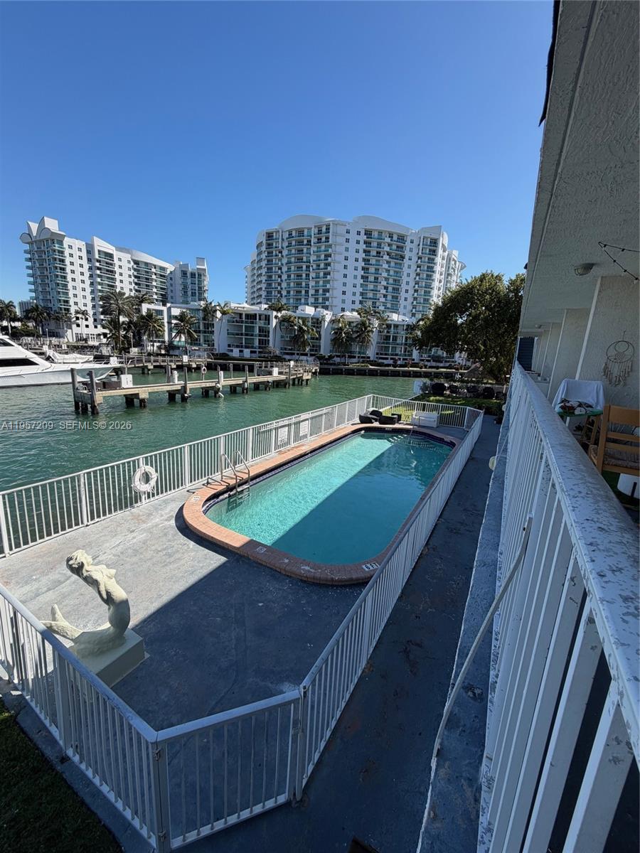Stunning Intracoastal water views from this well-maintained 1-bedroom, 1-bathroom residence. Features include tile flooring throughout, central air conditioning, and large windows offering abundant natural light. Private balcony. Unit includes assigned parking and access to community pool. Excellent rental opportunity in a desirable waterfront location.