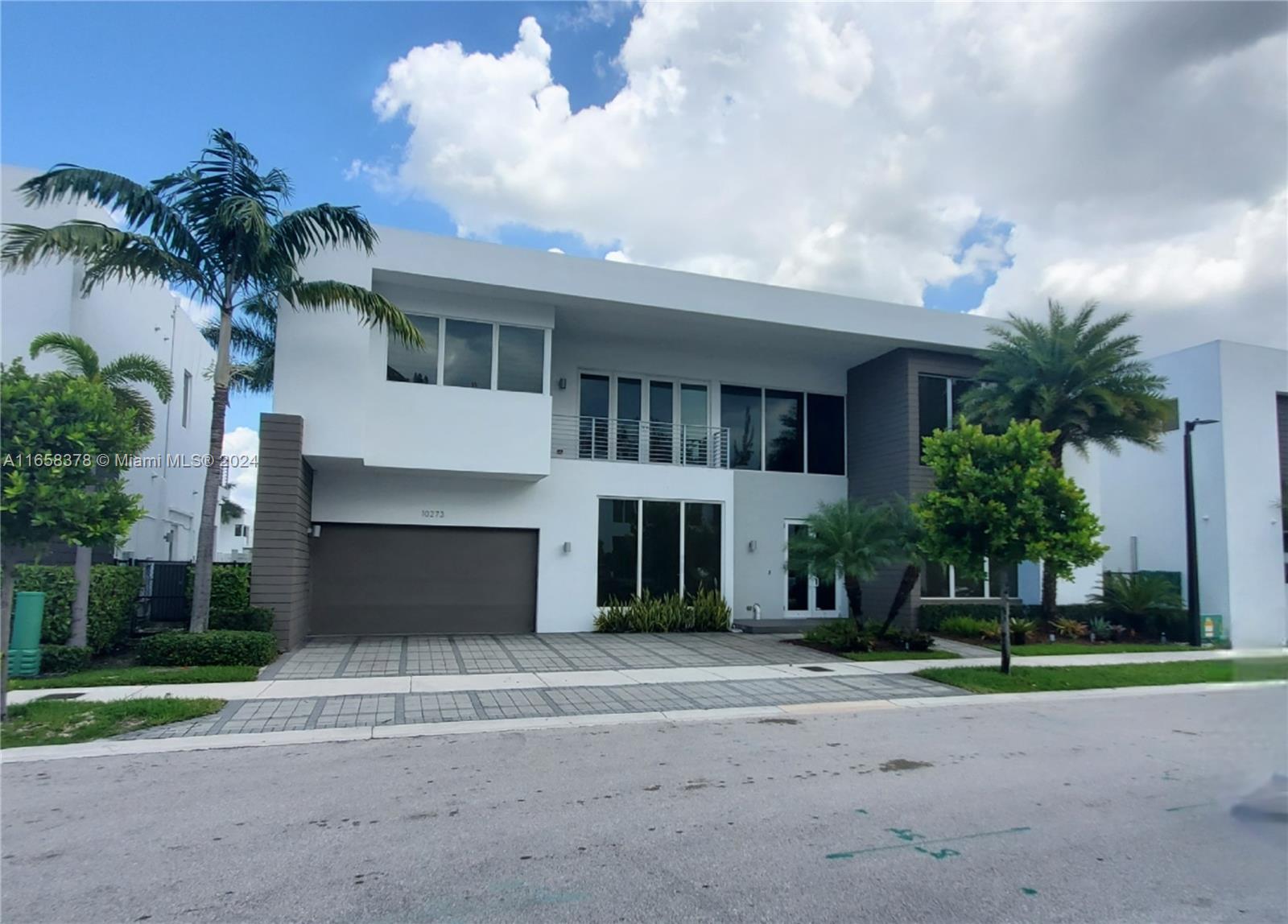 Stunning lakefront property boasting 5 spacious bedrooms, each featuring its own private inside bathroom. State-of-the-art Italian kitchen, designed by MIA CUCINA, perfect for family reunions. Italian doors throughout. Marble and wood floors, glass and steel staircase railing. Pre-wired for smart home system. Embrace the beauty of nature in your backyard oasis, complete with a charming oak pergola by PATIO DESIGN DISTRICT, built-in BBQ, sink, refrigerator, ice maker and summer kitchen. Located in a gated community with 24-hour security, enjoy peace of mind and access to exclusive amenities like a community pool, clubhouse, and gym. Indulge in the epitome of upscale living in this impeccable home, where every detail has been carefully crafted for your utmost comfort and pleasure.