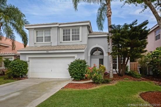 Wonderful home located in sought after gated community of Symphony Bay. Spacious 3/2.5 + loft home (can easily be converted to 4th bdrm) w/2 car garage & lake view. This home features an open flr plan w/vaulted ceilings in foyer & living rm, tile & laminate flring throughout, full house hurricane shutters, spacious master  w/walk-in closet. Well maintained kitchen opens to the family rm. The water views can be enjoyed from the large screened patio w/hot tub & BBQ. Pool, tennis, clubhouse, tot lot & more.