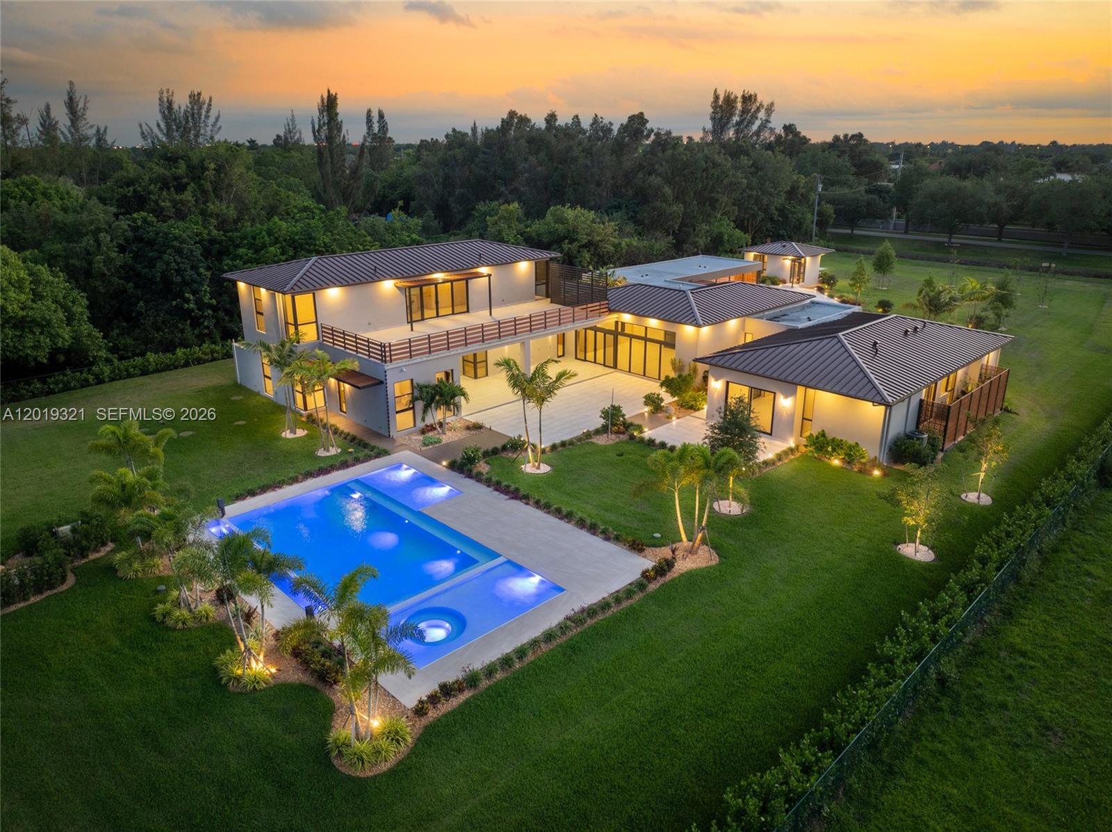 New Construction Luxury Estate in the heart of Southwest Ranches! Situated on 2.29 acres, this private resort-style residence offers 10,287 SF under A/C and 11,468 SF total. Featuring 7 bedrooms, 6.5 bathrooms, office, separate guest house/cabana suite, soaring ceilings, Italian kitchen, porcelain floors, and an incredible infinity heated saltwater pool & spa. Designed for luxury living with expansive outdoor spaces and endless potential for future agricultural or recreational additions. Horse-friendly property with room to expand. Prime location on a main avenue with quick access to I-75, shopping, dining, and top nearby amenities while maintaining the privacy and lifestyle Southwest Ranches is known for. A rare opportunity to own a newly built estate combining modern luxury, land, and flexibility.