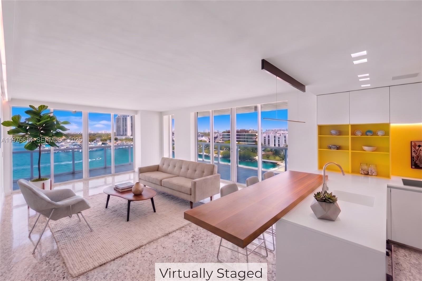 Welcome to the Grand Venetian, a beautiful boutique luxury building by renowned architect Kobi Karp perched on the waterfront of Belle Isle. Enjoy your new exceptionally walkable and bikeable Miami Beach neighborhood near Sunset Harbour and adjacent to Belle Isle Park, a shaded green oasis.

Unit 904, located in the building’s most coveted northeast corner, features an expansive wraparound balcony accessible from every room with panoramic views of Biscayne Bay, Miami and Miami Beach skylines. The no expense spared renovation features Boffi cabinetry and fixtures in the kitchen and bathrooms, Miele appliances with a retractable cooktop vent and a smart home system with Lutron lighting, automatic blinds, hardwired Wi-Fi with extenders, Sonos and Nest systems and two wall mounted Sony televisions. The primary suite is a spa like sanctuary with a large soaking tub and slab marble steam shower both with sweeping bay views. The bathrooms include Toto smart toilets and all closet systems contain custom Poliform shelving. Included with 904 are two parking spaces - one designated and one valet.

The building has on-site management and collects full reserves with extremely solid financials. The top-tier amenities encompass a full-time doorman, free valet parking for guests, bayside state-of-the-art fitness center, pool, hot tub, outdoor kitchen, tennis court and private bay access. High speed internet included in maintenance fee.

Be sure to check out the virtual tour.