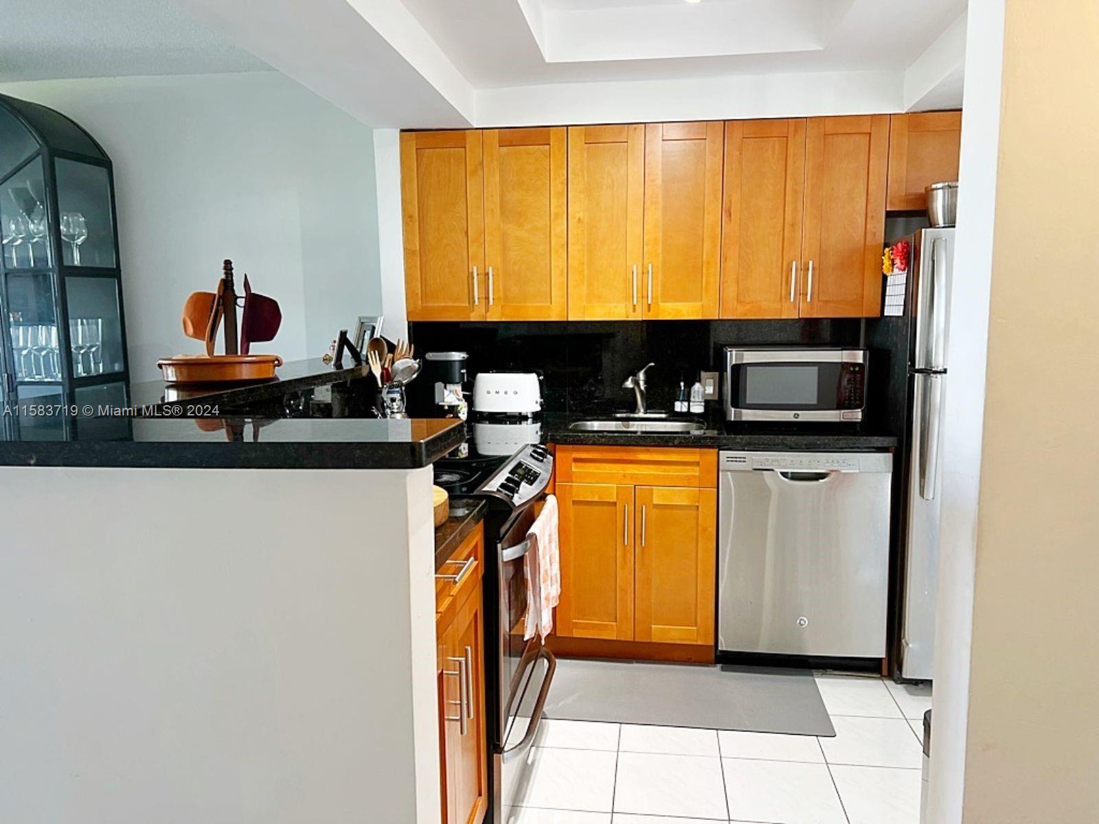 ENSENADA CONDO BLDG E-II - Residential Lease