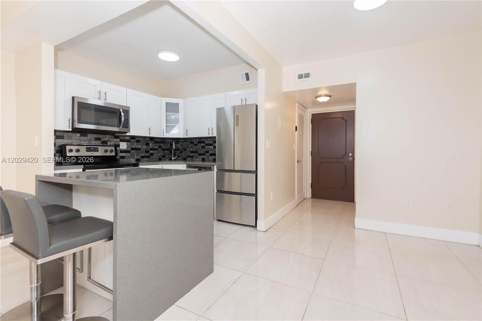 Looking for an apartment with just 5% down? We have the perfect option for you! Best Value in the Area! No Special Assessments. This 2-bedroom, 1.5-bath residence offers the perfect combination of location, functionality, and affordability. Excellent opportunity for both homeowners and investors seeking long-term value in Miami. Features include an in-unit washer and dryer, electric blinds, assigned parking, and secure gated entry. Unbeatable location, zero special assessments. Priced to move.