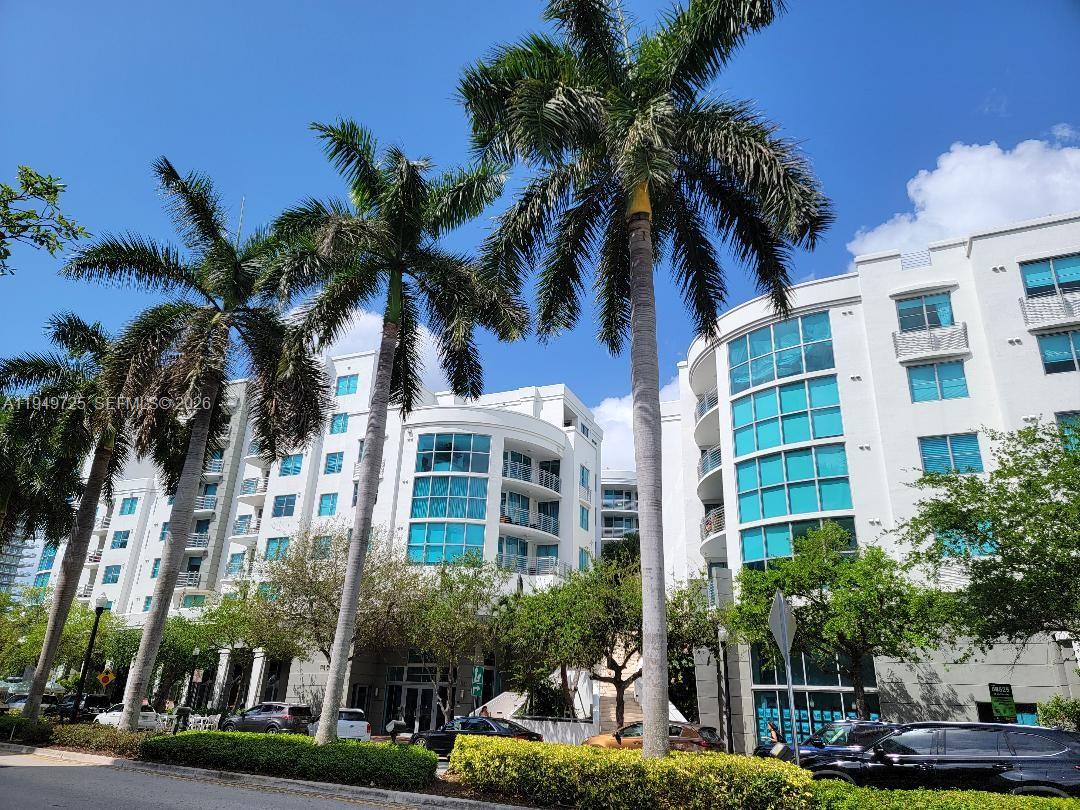 Special Lanai style unit with an oversized private patio area with access to pool deck.  All tile floors, open kitchen, stainless steel appliances, washer/dryer inside unit. One assigned covered parking space.  Building offers 24 hour lobby attendant, valet services, pool, jacuzzi, gym, sauna. Within walking distance to South Pointe Beach and dog parks, restaurants.  This unit is being sold furnished or unfurnished.  Artwork are not included, can be purchase separately.