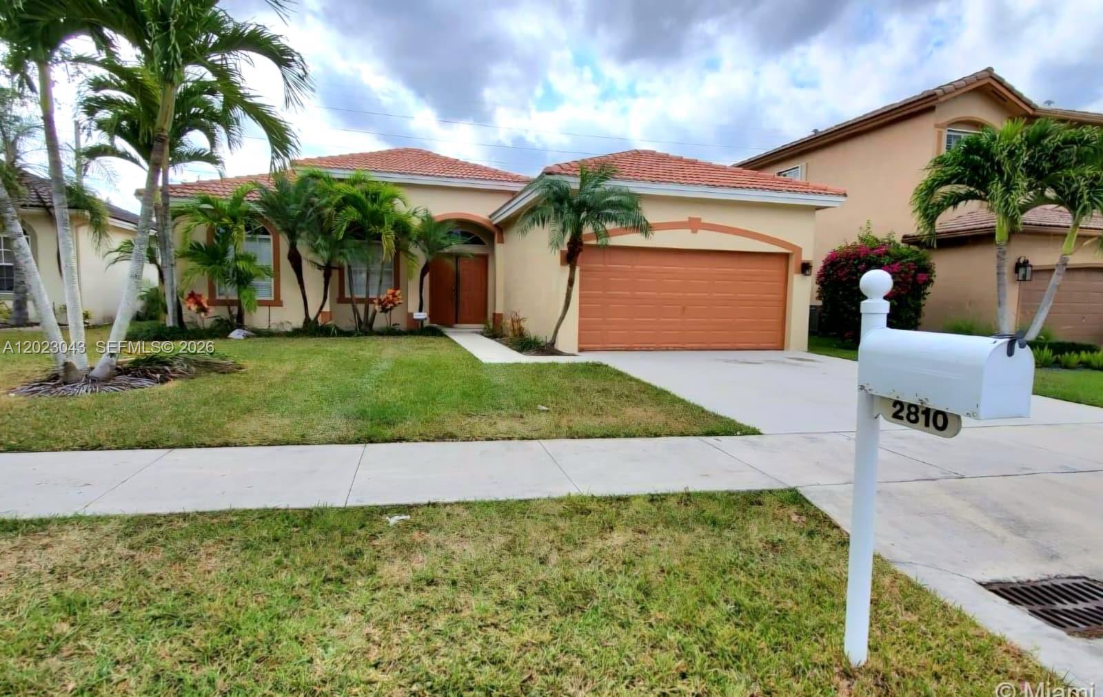 Move in ready home located in the sought after gated Fairways at Keys Gate community, offering added security and peace of mind. Buyers can also qualify for a lender credit of $7,500 toward closing costs. Ask for details. Features a well-designed split floorplan for privacy and comfortable living, plus a spacious living area with formal dining space, ideal for entertaining and accommodating full dining furniture. Additional highlights include a 2-car garage, beautiful landscaping, fruit trees, irrigation system, and new A/C installed in 2024. Enjoy access to resort style amenities throughout the Keys Gate communities, including pool access, security patrol, and a golf course clubhouse currently undergoing exciting renovations and upgrades. HOA includes internet, Direct TV, and alarm security. Conveniently located just minutes from shopping, grocery stores, schools, Turnpike access, and only about 30 minutes from the Florida Keys. A perfect blend of comfort, convenience, and relaxed South Florida living.