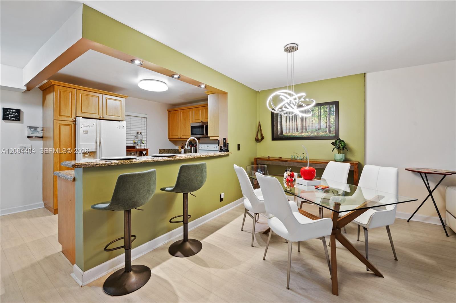 Wake up to peaceful lake views in this bright and spacious 2BD/2BA first-floor condo located in the sought-after 55+ Meadowbrook Lakes community. Enjoy a screened patio, open layout, assigned parking, pool, clubhouse, and BBQ area. Just minutes from beaches, shopping, dining, and Fort Lauderdale Airport. Your South Florida retreat awaits!