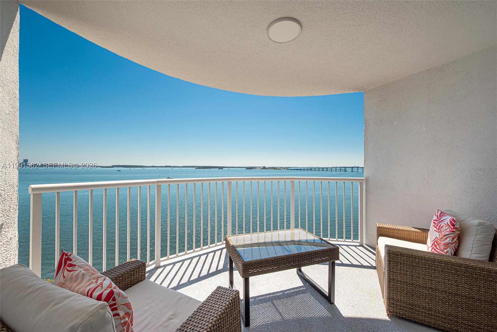 Spectacular waterfront corner residence on the 10th floor offering stunning 180-degrees unobstructed water views. Located in a charming boutique building in the heart of Brickell,  this premium updated 3-bdrm, 2-bath apartment features a bright, open layout. With the bay directly in front of the property, the views are protected & will never be obstructed. Upon entry, you’re welcomed by a spacious living/dining/kitchen area that flows seamlessly together, all overlooking breathtaking blue water views. Step out onto the private balcony to take in picturesque scenery of the bay, passing boats & the iconic Key Biscayne Bridge. As a corner unit, the residence offers added privacy along with expansive views. The home features a modern open kitchen, elegant new flooring throughout &  beautifully remodeled bathrooms. The primary suite includes a generous walk-in closet, along with ample storage throughout. This residence also includes a private storage area which is located on the same floor & two assigned parking spaces, a rare find in Brickell. Residents enjoy a full suite of amenities, including a fitness center, pool, jacuzzi & community room. A truly exceptional opportunity to enjoy waterfront living with forever unobstructed views located far away from the nightlife of the Brickell noice, but close enough to shops & restaurants with a 10 minute walking distance. 50-year recertification passed, offering peace of mind. Enjoy the benefit of low HOA fees.