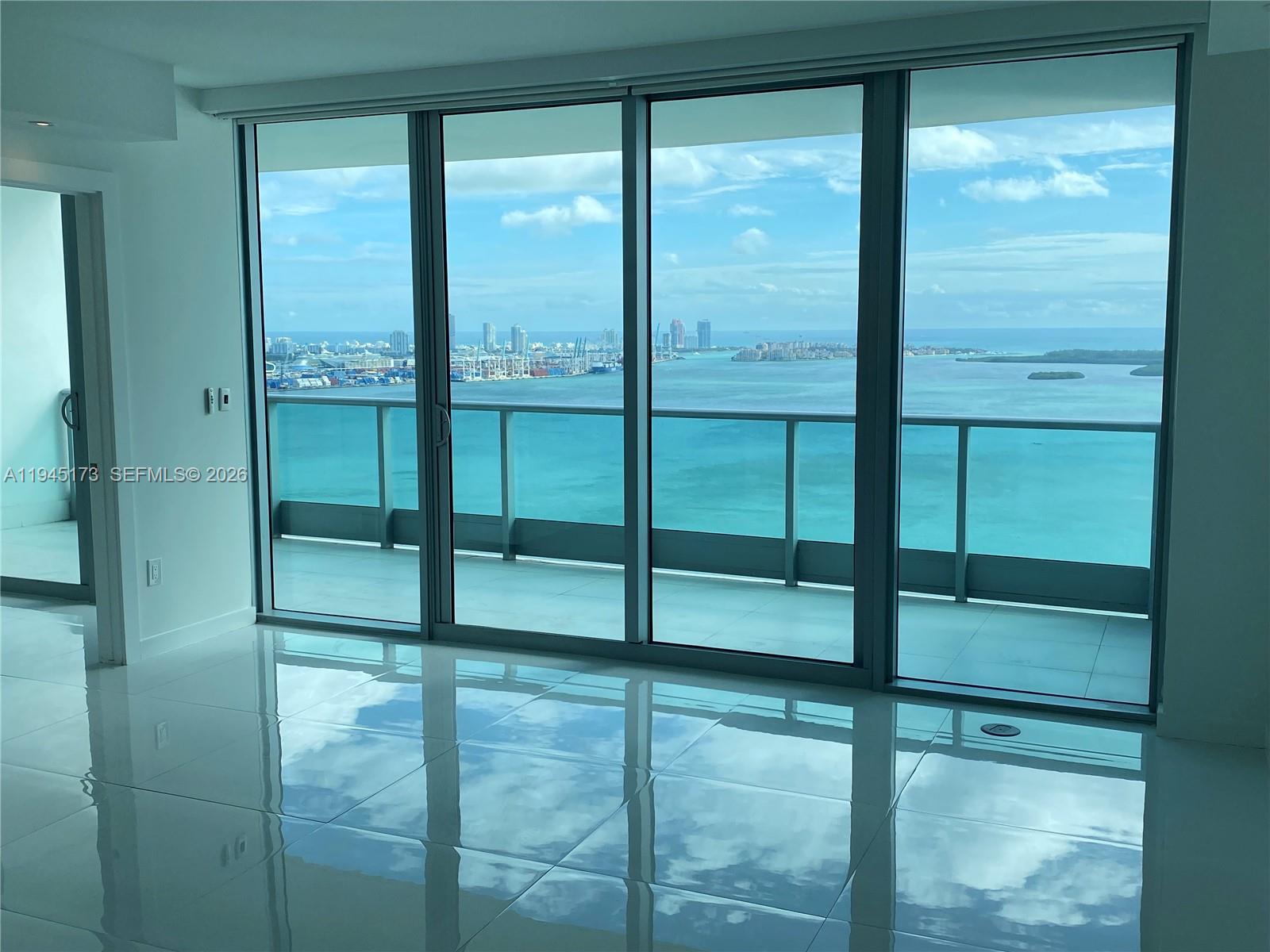 Experience unparalleled luxury high above Miami in this coveted 41st-floor residence at Jade Residences, showcasing breathtaking, unobstructed panoramic views of Biscayne Bay, the ocean, and the dazzling city skyline. This rarely available flow-through 3-bedroom, 3-bath home offers over 2,130 sq. ft. of elegantly designed living space, featuring a gracious layout, private elevator foyer, and expansive floor-to-ceiling windows that bathe the residence in natural light and frame spectacular sunrise-to-sunset vistas. 

Ideally located in one of Brickell’s premier waterfront towers, Jade delivers the perfect blend of resort-style living and urban convenience—just steps from world-class dining and shopping, with quick access throughout Miami. 

Residents enjoy an exceptional collection of five-star amenities, including a state-of-the-art fitness center, spa with sauna and steam room, racquetball court, infinity-edge pool, rooftop sky lounge and observation deck, business center, concierge services, and 24-hour security and valet—creating an extraordinary lifestyle for both everyday living and sophisticated entertaining.