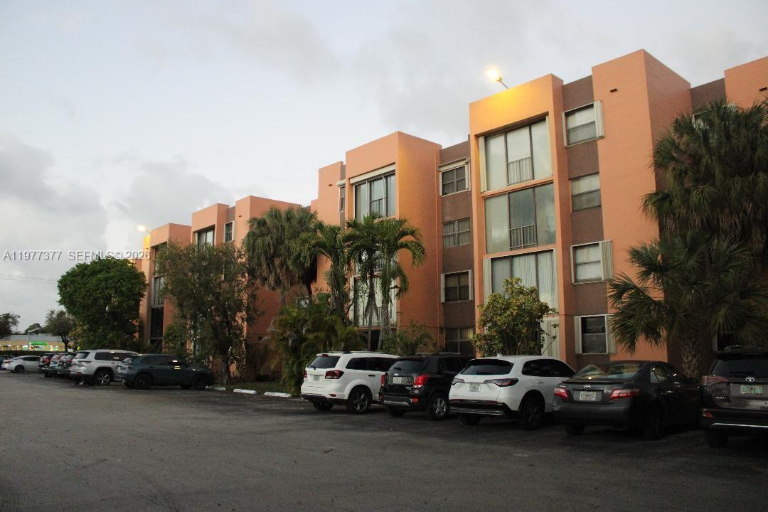VERSIALLES GARDENS II CON - Residential Lease