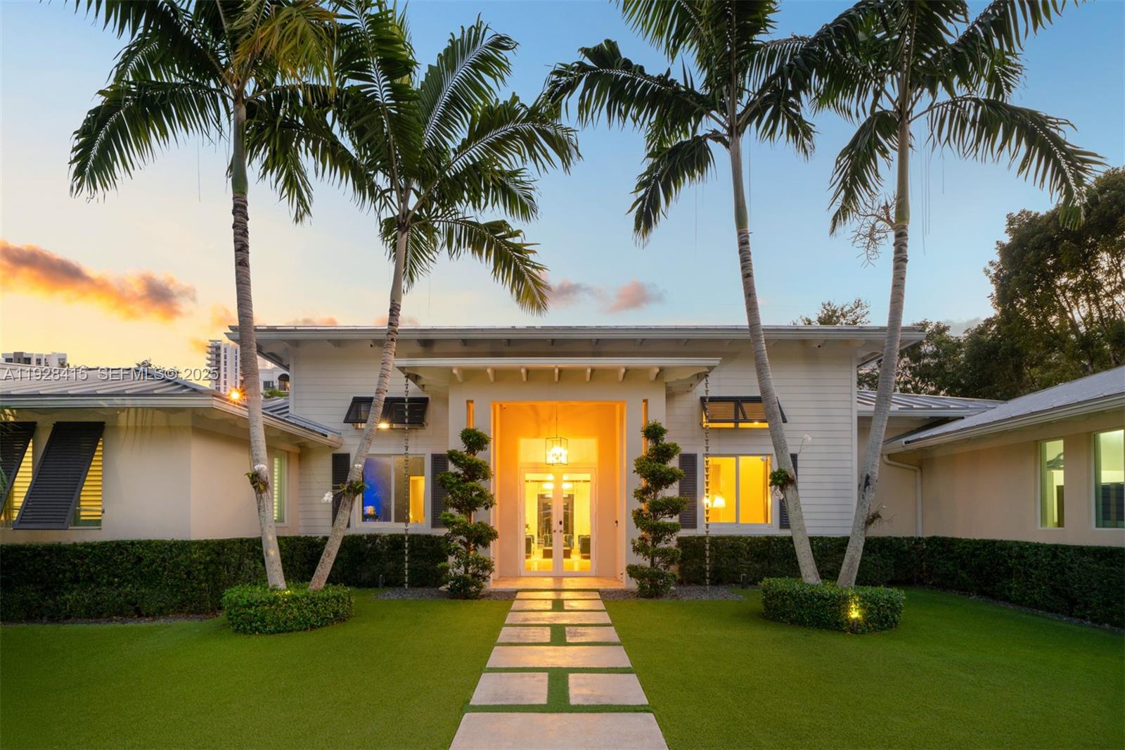 Gorgeous custom-built one-story estate tucked within a private gated cul-de-sac of just four residences in South Miami. Inspired by timeless Bahamian design, this impeccably crafted home welcomes you through an elegant foyer into expansive living spaces filled with natural light and tranquil garden views. Exceptional finishes are showcased throughout, including a gourmet chef’s kitchen with custom cabinetry, Thermador and Sub-Zero appliances, walk-in pantry, and breakfast area that opens seamlessly to a spacious family room. The primary suite is a true retreat, offering a sitting area, generous walk-in closet, and spa-like bath adorned with Cuban tile floors, a floating soaking tub, and glass-enclosed shower. Designed for effortless entertaining, the backyard features a covered terrace, summer kitchen, cabana bath, resort-style pool with waterfall, playground, in-ground trampoline, and basketball court. Additional highlights include a dedicated home theater, impact windows and doors, a metal roof, marble floors, and a two-car garage.