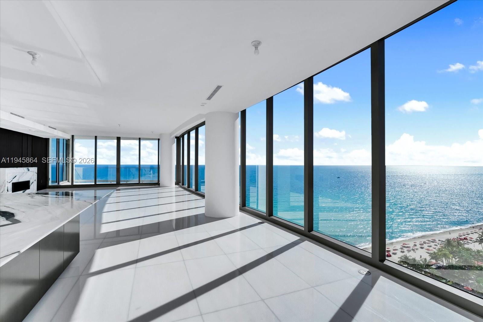 The most sought-after floor plan at The Estates at Acqualina, this five-bedroom Amalfi residence offers 4,780 square feet of interior living space and an extraordinary 50 feet of direct ocean frontage. A light-filled, open layout is appointed with Molteni kitchens and closets, marble flooring throughout, and a private in-residence sauna. The primary suite features separate his-and-hers bathrooms, each exquisitely clad in floor-to-ceiling onyx. A true white canvas, this residence presents the perfect opportunity to create your future dream home while enjoying the unparalleled five-star, five-diamond lifestyle that only Acqualina can offer.