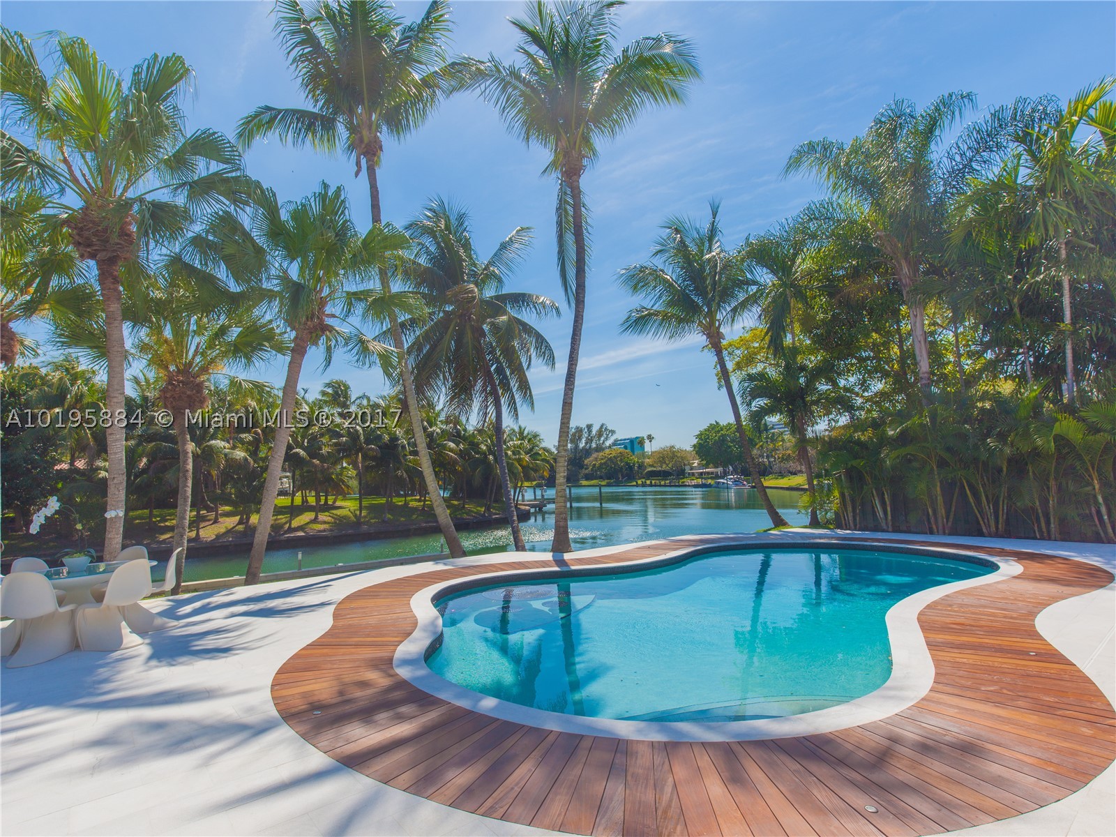 Boaters Delight - 98ft of waterfront with unrestricted bay access. Relax year-round while enjoying tranquil water views in the highly sought after private guard-gated community of Bay Point. This spectacular 3 bed home has just been renovated. It has an open floor plan with ample social areas and 2 master suites in different wings of the house. 2,526 sq ft living area, 12,740 sf. lot. With 24/7 security guards patrolling neighborhood, it is a perfect place for families. Minutes to Design District.