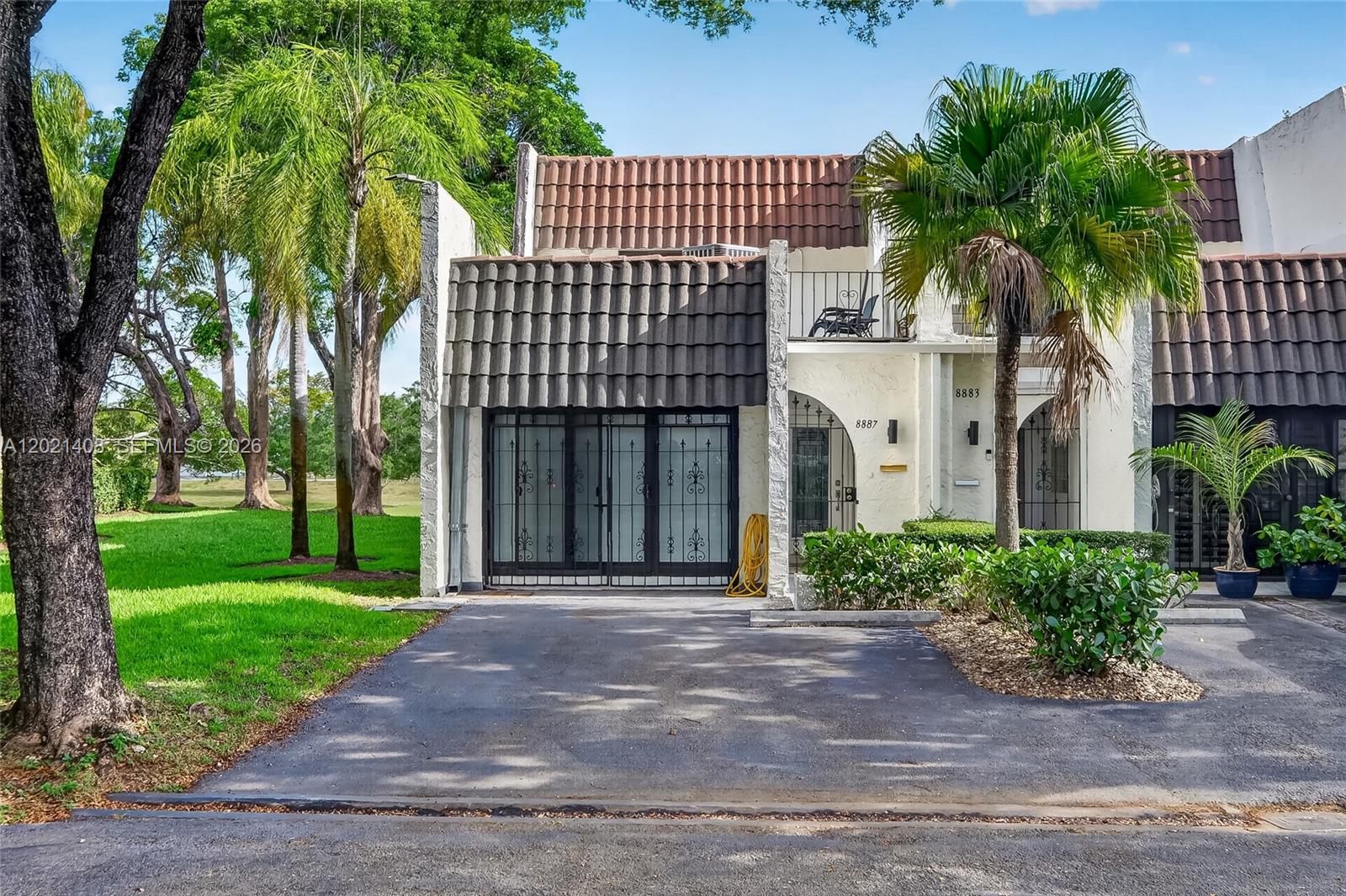 Spectacular corner townhouse in a natural setting, not to be believed! Enjoy the path among these 20+acres of lush, natural landscape. Hidden Valley is fenced and gated for privacy. First enter into the family room of this very special townhouse with light tile thruout 1st floor. White remodeled kitchen w/quartz counters, glass backsplash, eat-in area, open to very spacious dining/living room. All impact windows and doors thruout, lots of natural light. Unique tile on staircase w/hardwood steps. Laundry on 2nd floor. Two very large primary suites, each w/private bath, one has a deck for your relaxing evenings. Hardwood flooring under carpets 2nd floor. 2 AC units. Pool and tennis courts.