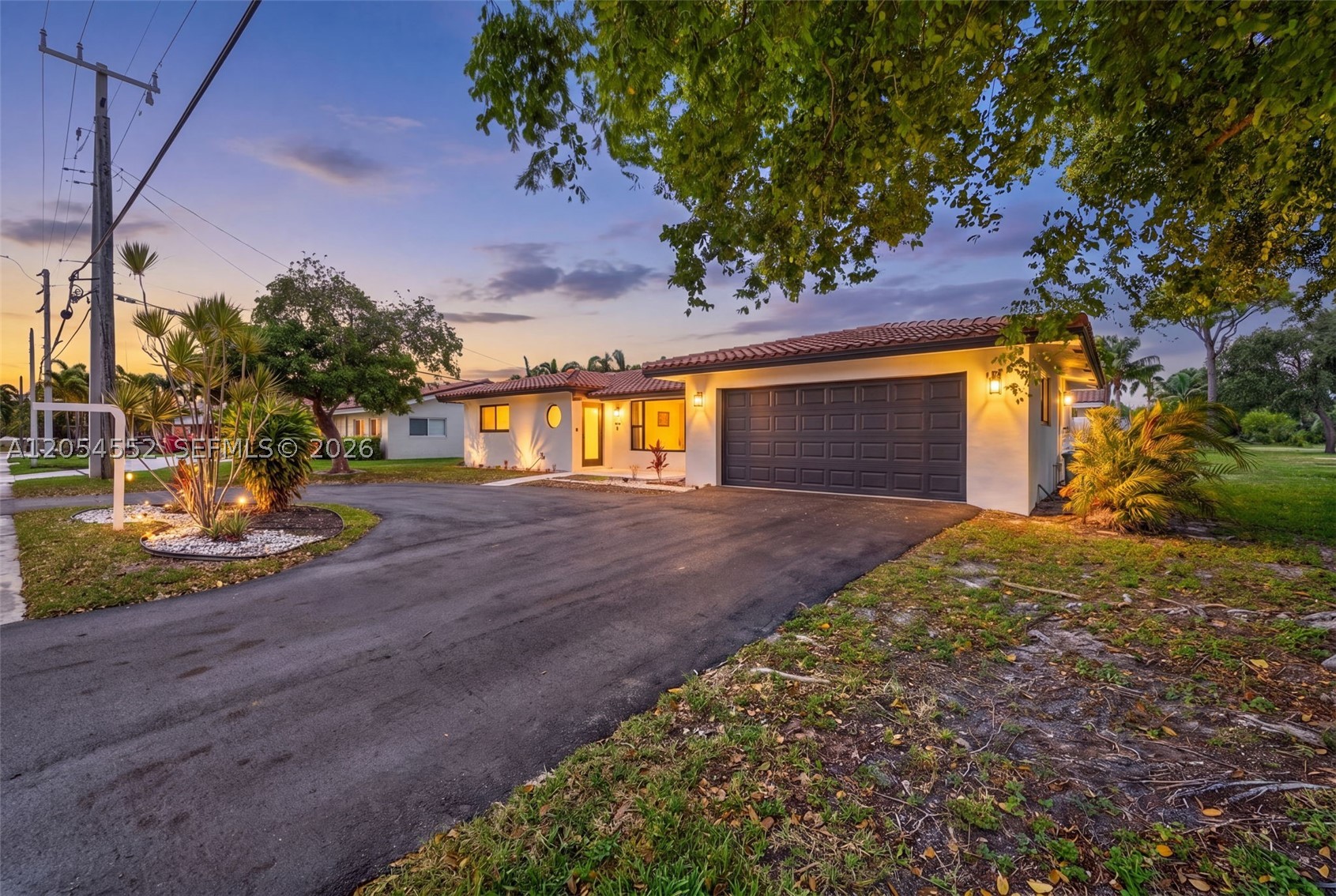 One or more photo(s) was virtually staged. Welcome to this beautifully updated 2-bedroom, 2-bathroom home with a 2-car garage and circular driveway, located in the highly desirable Cove neighborhood of Deerfield Beach. Situated on an oversized corner lot, this home is just a short distance to The Cove Shopping Center, marina, sand, ocean, restaurants, and shops.The home features all hurricane impact windows and doors, 2018 roof, freshly painted interior and exterior, tile floors in living and dining areas, and laminate flooring in the bedrooms. Updated kitchen with Corian countertops and remodeled bathrooms with upgraded finishes make this home move-in ready.
Prime corner-lot location, minutes from the beach—ideal for investors orshort-term rentals with No HOA.