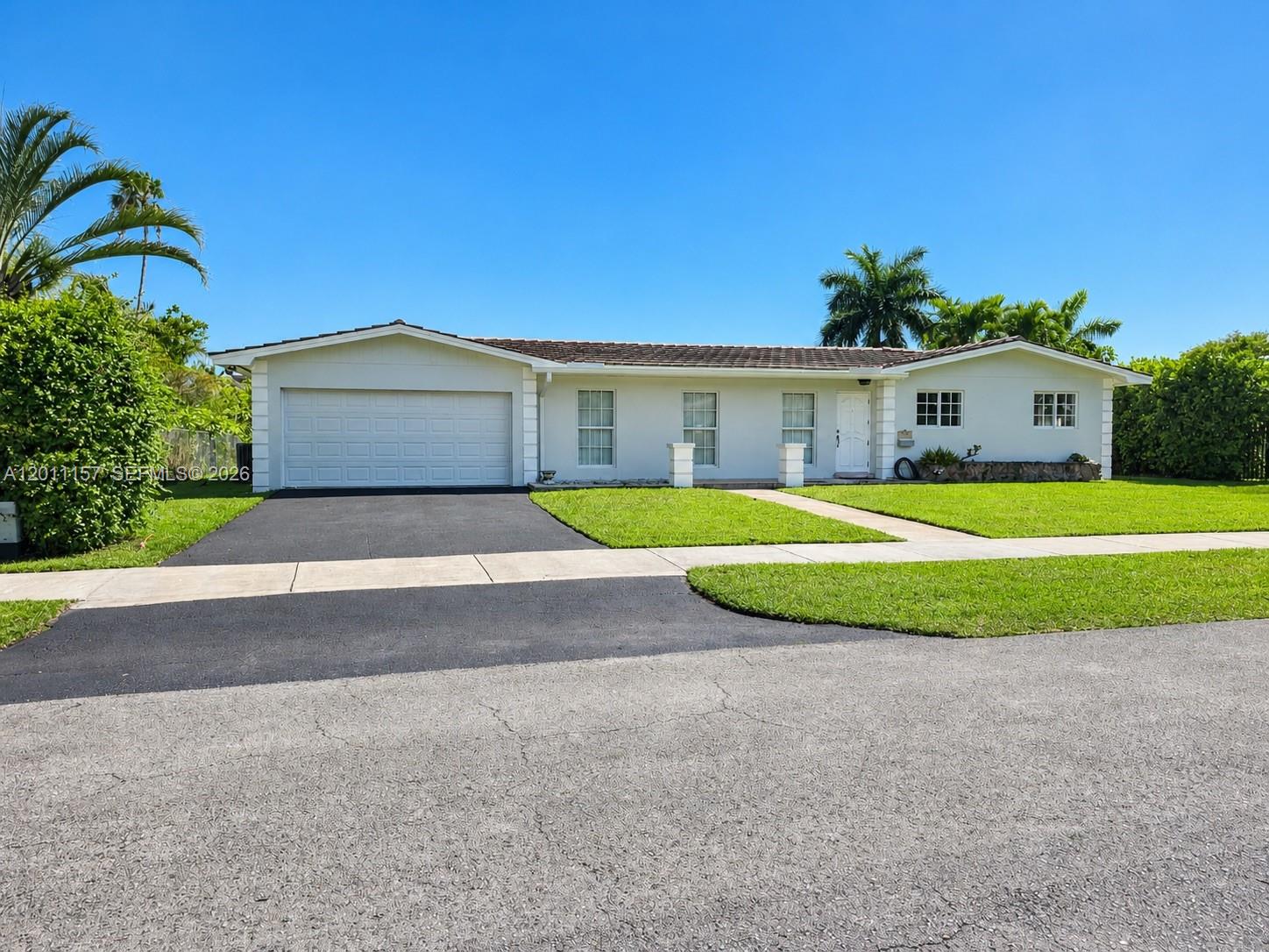 Stunning lakefront retreat in sought-after Kendall Lakes! Situated on a quiet street, this beautifully renovated 4-bedroom, 3-bath home offers 1,763 sq ft of stylish living space and double garage on an expansive 0.28-acre lot. Thoughtfully updated with a new roof, impact windows, modern kitchen appliances, and a screened pool and patio, this home blends comfort, style, and functionality. Enjoy peaceful water views and a prime location close to schools, shopping centers, parks, recreational amenities, and quick Turnpike access.