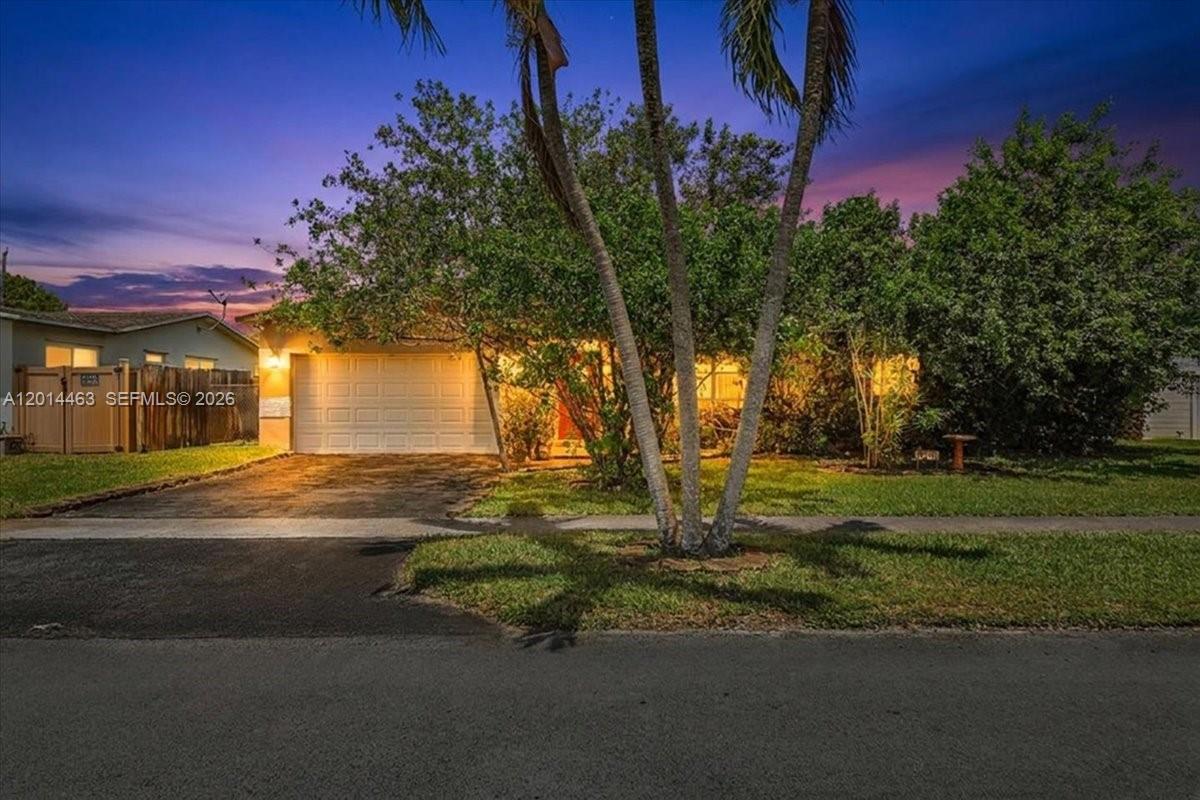 Did you say NO HOA.... Look no further, lowest priced SFR in the area... This 3 beds, 2 baths and 2 car garage home offers a bright layout with neutral wall and ceiling tones, a spacious living area, and abundant natural light from oversized windows throughout as well as great and spacious outdoor. Features include carpeted floors, a functional pantry, and generous interior spaces ready for customization with great open areas. The exterior boasts a screened patio, open porch, and a large backyard with plenty of room and even the possible option of a pool, possibilities are endless. The property also includes three storage sheds, providing ample space for equipment or additional storage. Conveniently located near Brian Piccolo Sports Park and Cooper City High School, with easy access to Stirling Road and Florida's Turnpike. Some pictures may have been digitally enhanced for marketing purposes.