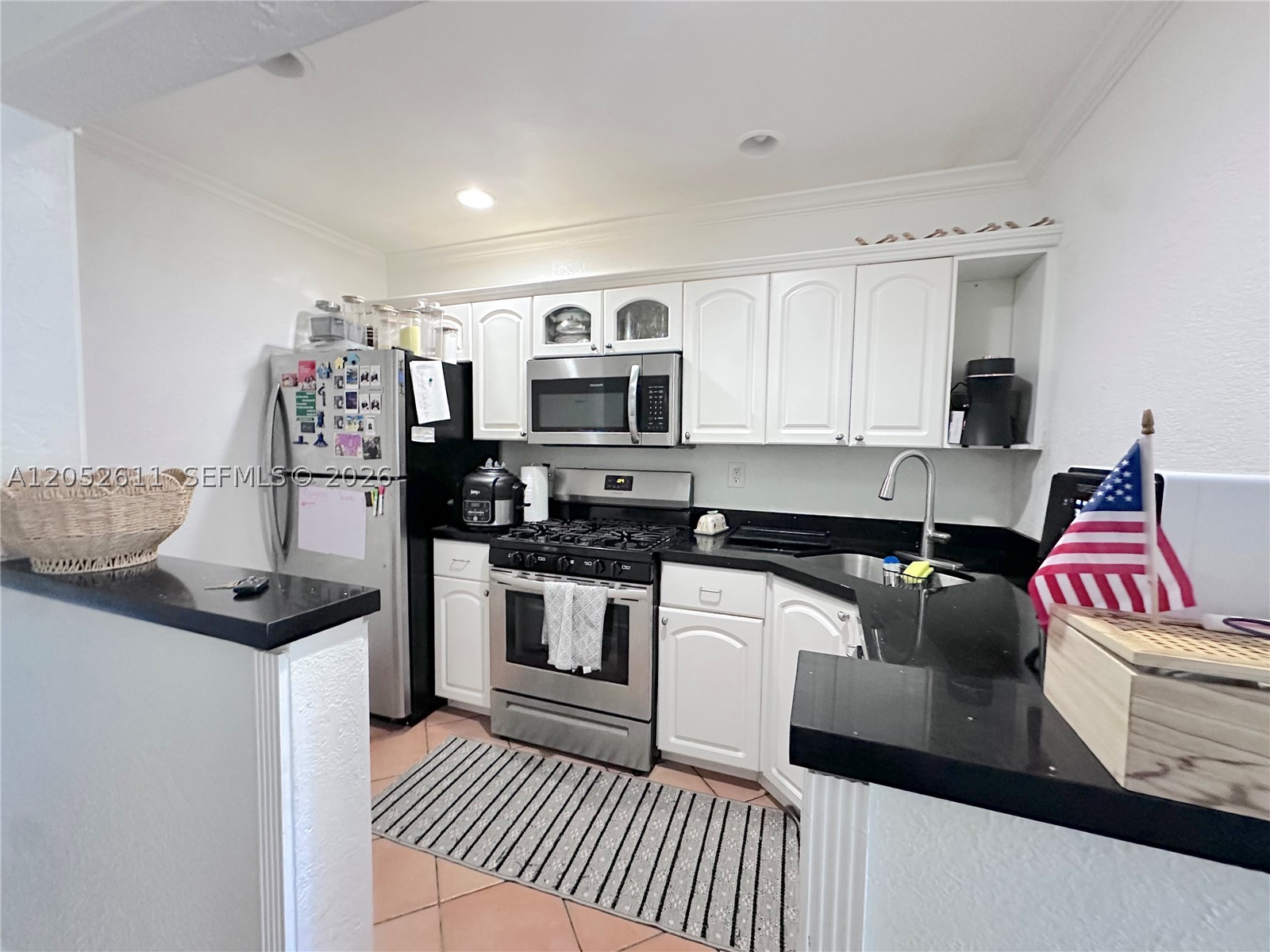 Beautifully upgraded 2-bedroom, 2.5-bath condo in the desirable Villas of Pinecrest, located within the highly sought-after Pinecrest Elementary School district. This move-in-ready home features quartz countertops, impact windows and doors, tile flooring throughout the main living area, an in-unit washer and dryer, and a tranquil garden view. It shows beautifully and is ideally situated just minutes from the University of Miami and Dadeland Mall.

Enjoy the convenience of being within walking distance to Dadeland North Metrorail Station, making commuting a breeze. Residents of this gated community benefit from 24-hour security, onsite management, and excellent amenities, including a swimming pool, tennis court, and fitness center.