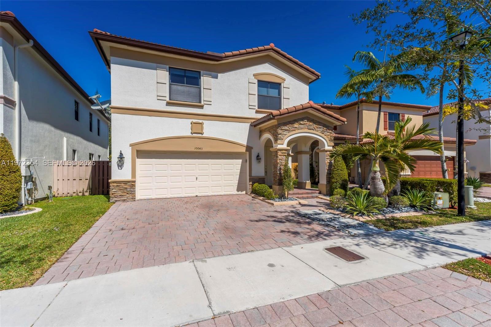 Step into this beautifully maintained 5-bedroom, 4.5-bath residence nestled within the prestigious gated community of Isles at Grand Bay in Doral. Designed with both comfort and functionality in mind, this spacious home offers an ideal layout for everyday living and effortless entertaining. Bright, open living areas create a welcoming atmosphere, complemented by generous storage space and well-appointed walk-in closets throughout. The home also features a tastefully remodeled Italian-style kitchen, offering both elegance and modern functionality. The private, fenced backyard provides a serene outdoor retreat—perfect for relaxing evenings or hosting gatherings with family and friends.Residents of Isles at Grand Bay enjoy access to exceptional resort-style amenities, including a clubhouse, swimming pool, fitness center, and a variety of recreational facilities.Offered furnished or unfurnished, this property presents a flexible opportunity to suit a range of lifestyles. Don’t miss your chance to own a meticulously cared-for home in one of Doral’s most sought-after communities.