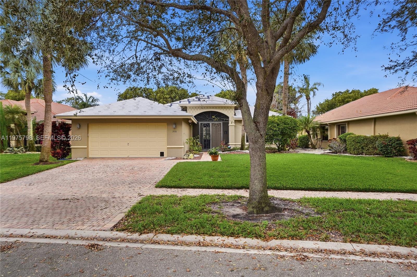 Welcome to Tivoli Reserve in Boynton Beach, where resort-style living meets comfort and elegance. This impeccably maintained 3-bedroom, 3-bath residence offers spacious living and thoughtful upgrades throughout, including a brand-new roof for peace of mind. The home features a bright, open layout perfect for both everyday living and entertaining. Step outside to a screened-in patio overlooking a serene garden, creating a private outdoor retreat ideal for relaxing mornings or evening gatherings. Residents of Tivoli Reserve enjoy access to breathtaking, newly renovated amenities, including a stunning clubhouse with a resort-style pool, pickleball and tennis courts, a fully equipped fitness center, media room, lounge areas, and a beautifully designed dining and kitchen space for social events and community gatherings. Located in one of Boynton Beach’s most desirable active lifestyle communities, Tivoli Reserve offers a vibrant atmosphere, beautifully maintained grounds, and convenient access to shopping, dining, and major highways. Experience the perfect blend of luxury, comfort, and community living.