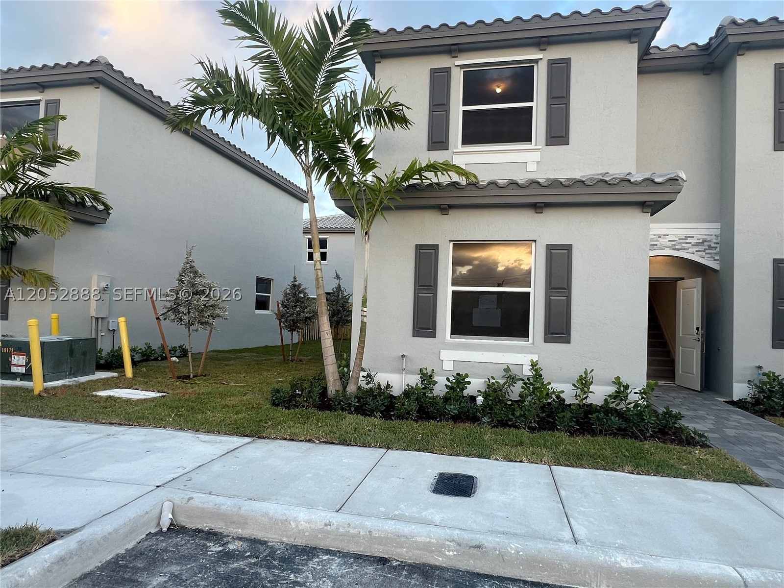 This two-story townhouse features three spacious bedrooms and three full bathrooms. One bedroom and one bathroom is on the first floor. The open-concept layout includes a family room, dining room, and kitchen, while a separate living room offers additional space for relaxation and entertainment. One bedroom is downstairs. The kitchen has stainless steel appliances, quartz countertops, and plenty of cabinet space. Elegant ceramic tile flooring, while the second floor is covered in comfortable carpeting. You'll enjoy a fenced patio, perfect for relaxing or entertaining. Clubhouse, tennis court, golf course, and pool. This property accepts Section 8 vouchers. Only one deposit to move.