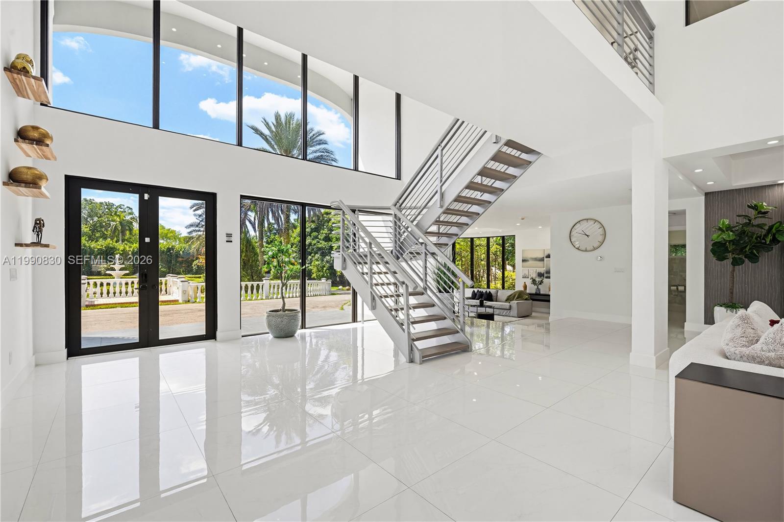 Under $6M. Masterpiece of Luxury, Athletics, Fully Furnished and Private Cinema on 2.5 Acres.
Elevate your lifestyle at 14401 Sunset Lane, an unrivaled 6,128 sq. ft. modern compound where high-performance living meets total seclusion. Positioned in the heart of the exclusive Southwest Ranches, this 2.35-acre sanctuary has been meticulously reimagined as a premier residential resort for the most discerning steward.
The interior is anchored by a state-of-the-art professional movie theater, offering a cinematic experience that rivals commercial venues within the comfort of your own home. The six-bedroom floor plan provides unparalleled volume, including a master wing that serves as a private spa retreat and grand formal galleries designed for world-class art collections. For the athletic enthusiast, the grounds are a rare find: featuring a private track and field for elite training and regulation-sized basketball courts—all set against a backdrop of manicured tropical landscaping.
Beyond the resort-style in-ground pool, the estate remains equestrian-ready with ample space for custom stables or a guest house addition. With no HOA constraints, this is a legacy acquisition offering the ultimate freedom to live, train, and entertain at the highest level. South Florida’s most comprehensive private sports and cinema estate is now available for the next generation of excellence. NO HOA!