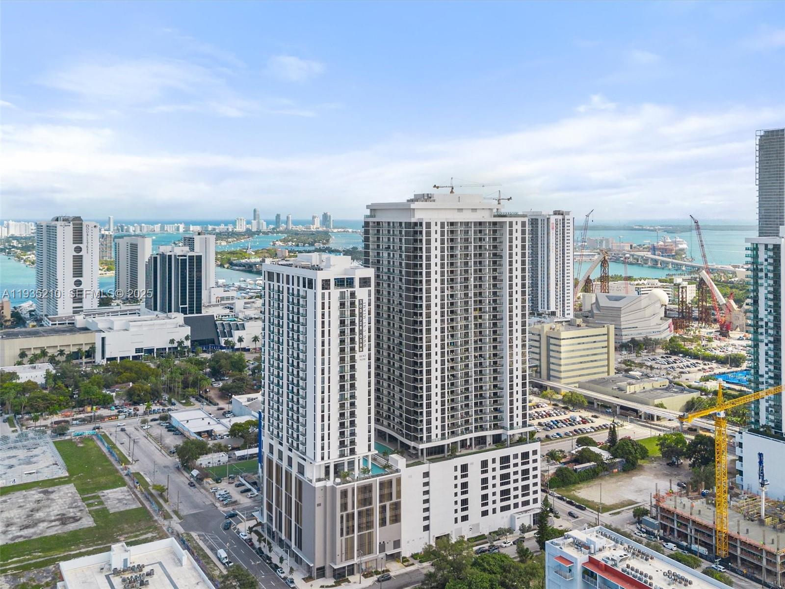 Exceptional high-floor corner residence offering the best water and skyline views in the building. This expansive 2-bedroom, 2-bathroom is a spacious layout with private balcony, fully furnished and move-in ready. 1-year lease. Rent includes all utilities except electricity. Prime location near Airport, Brickell, Midtown, Wynwood, Design District, dining, and shopping. Full-service building with 3 pools, Jacuzzi, 3,000-sq-ft gym, spa, yoga loft, racquetball court, theater, concierge, valet, on-site management, and 24/7 security.