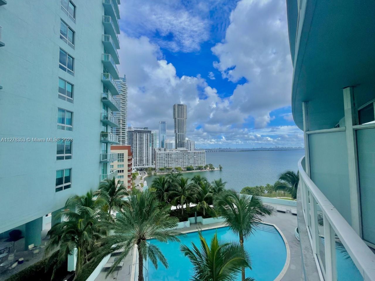 Welcome to one of Edgewater's finest at Quantum on the Bay! Large 1 Bedroom, 1 Bathroom with 2 covered side by side parking spaces , views of the Pool Area and the Bay. This unit features an open floorplan with spacious balcony, large walk-in closet, floor to ceiling glass that looks over the gorgeous bay and Edgewater skyline. European style kitchen with eat-in island, stainless steal appliances. Unit comes with brand new flooring through out. Valet services for guests and visitors. Amenities include a 2-Story Lounge, East and West Pools, Gym with Locker Rooms and WIFI in all Common Areas. Margaret Pace Park located right in front of the building with outdoor exercise equipment. Unit is empty and easy to show, call L/A agent for more details