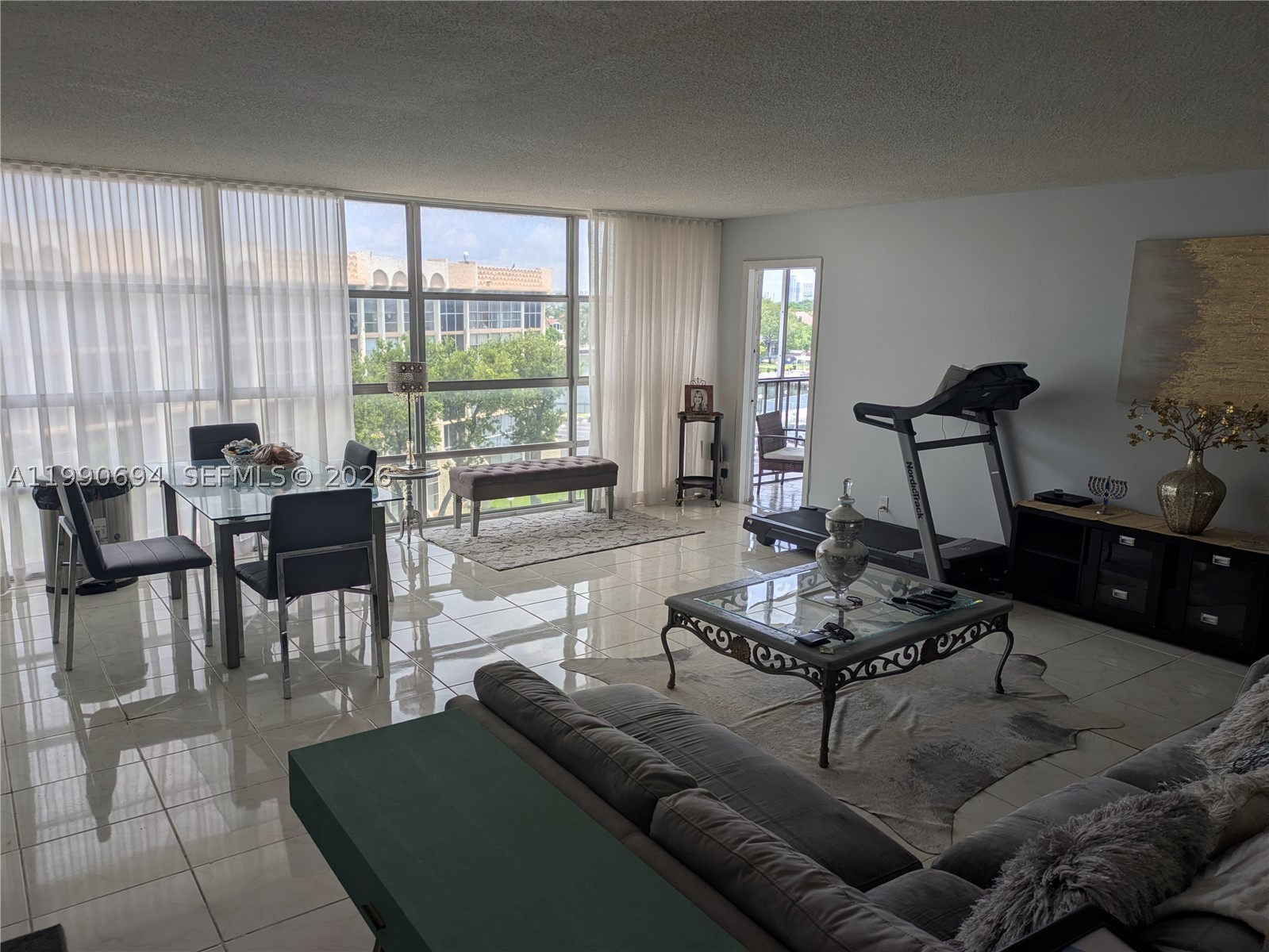 PRICE REDUCED FOR IMMEDIATE SALE--TOP FLOOR -- CORNER unit at 701 Three Islands Blvd, in the heart of Hallandale Beach’s sought-after Three Islands community. This bright and spacious unit is ready to be loved with a little TLC and offers an inviting open layout (c-c floorplan, one of the LARGEST), perfect for both relaxing and entertaining. Large windows fill the home with natural light, while the two private balconies provide a peaceful spot to enjoy tranquil water views. The generously sized SPLIT bedrooms offers comfort and privacy, complemented by plenty of closet space throughout. Some furniture could stay with unit. 
Residents enjoy access to a range of amenities, which may include a pool and secure building entry, all within a well-maintained waterfront setting. Ideally located just minutes from the beach, shopping, dining, and entertainment, this property offers the perfect blend of convenience and coastal living.
Whether you’re looking for a full-time residence, vacation getaway, or investment opportunity, Unit 510 is a fantastic place to call home.