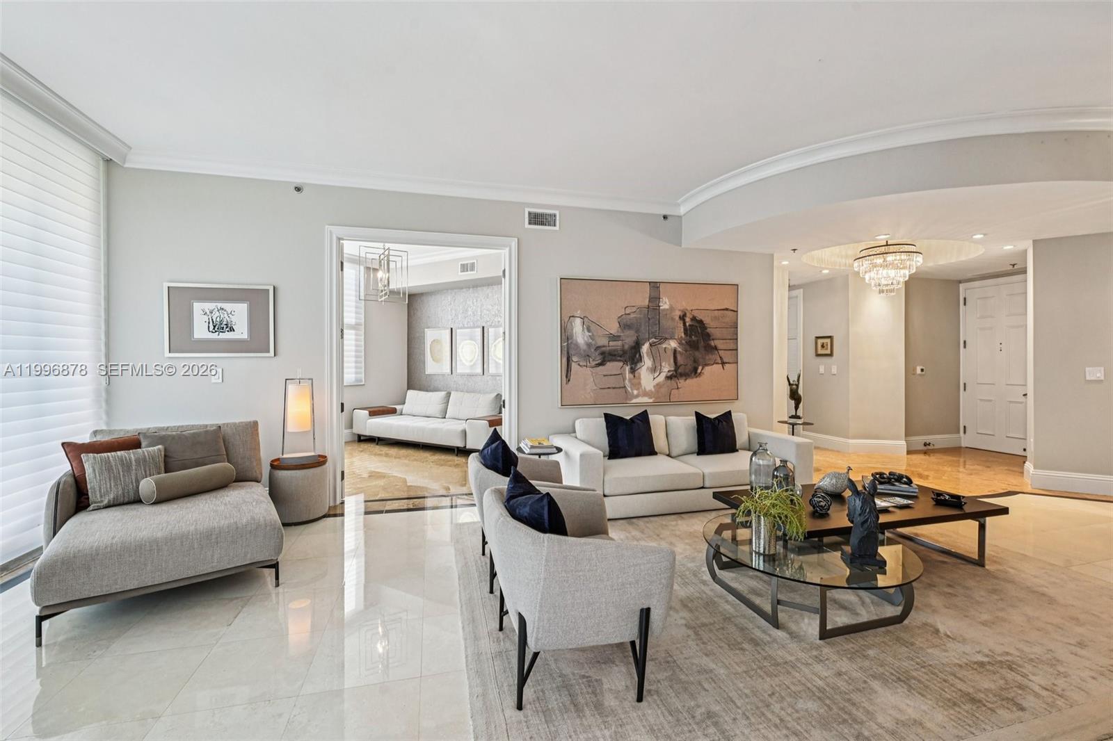 Very rarely available expansive 3-bedroom fully furnished residence at Gables on the Green. One bedroom is currently used as a home office or media room, offering flexibility to suit your lifestyle. Impeccably maintained and beautifully updated, this bright unit features a private elevator entry, a spacious layout, and a large balcony with breathtaking views of the Granada Golf Course and Coral Gables skyline—perfect for entertaining. Enjoy marble and cherry wood floors, floor-to-ceiling windows, custom closets, and a generous laundry room with service entrance. **Includes 2 covered parking spaces. Full-service building with attended lobby, pool, gym, and more. Prime location just steps from Miracle Mile, top restaurants, and minutes to the Biltmore, University of Miami, and MIA.