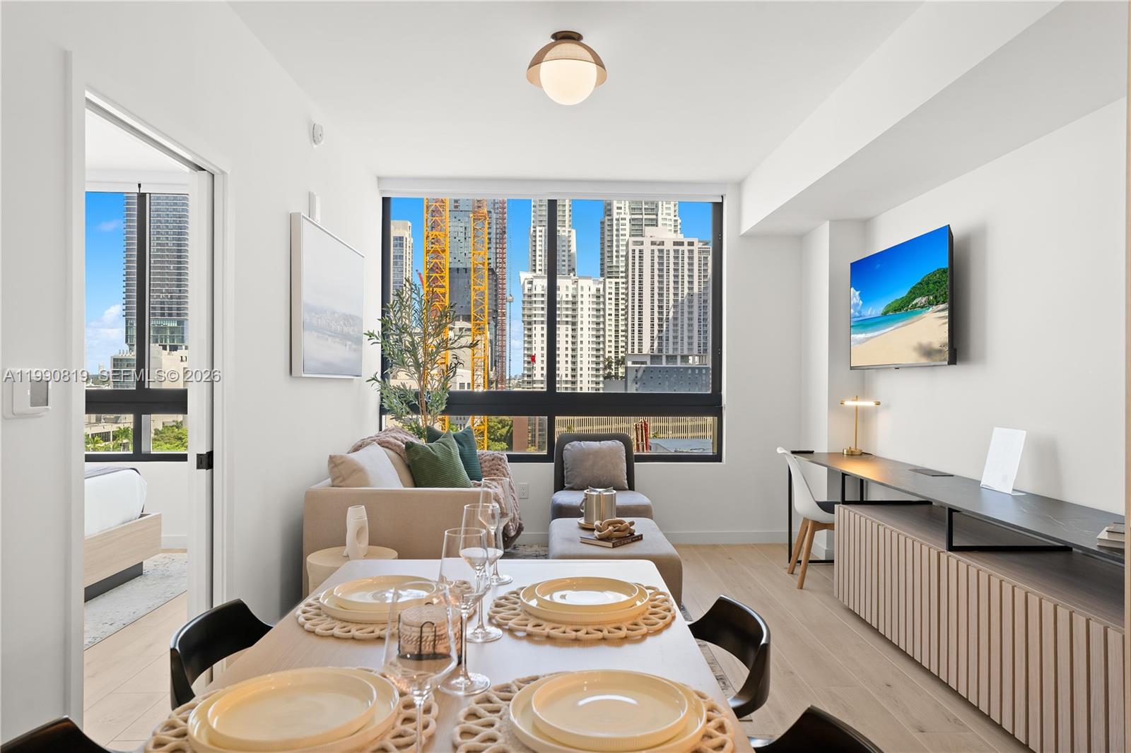 The District is Downtown Miami’s newest residential concept, offering a modern hybrid ownership model designed for today’s urban lifestyle. This fully furnished development features studio, one- and two-bedroom residences with premium Italian cabinetry, high-end appliances, and designer finishes throughout.

Residences include smart-home technology, integrated lighting, audio and window treatments, washer/dryer, and thoughtfully curated interiors by Meshberg Group. Floor-to-ceiling windows provide abundant natural light and city views.

The building offers over 25,000 square feet of amenities, including a rooftop pool deck with skyline views, fitness center with yoga studio, co-working spaces, indoor basketball and racquetball courts, private meeting rooms, and curated social areas.

Residents benefit from hotel-style services such as 24-hour security, valet, concierge, housekeeping, and on-site dining options. Ideally located in the heart of Downtown Miami, The District provides immediate access to Brickell, Miami Worldcenter, dining, shopping, and entertainment.

Ideal for investors and end-users seeking flexibility, design, and a vibrant Miami lifestyle.