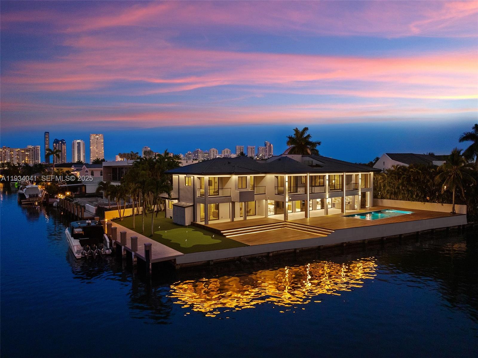 An uncompromising modern waterfront estate with 240 feet of open-bay frontage—designed to impress and impossible to replicate.

Welcome to this extraordinary newly renovated waterfront residence offering sweeping, unobstructed open bay views and a scale rarely found in Miami. This one-of-a-kind home exemplifies contemporary luxury, thoughtfully designed for grand entertaining and elevated living.

The residence features 6 expansive bedrooms and 7.5 spa-inspired bathrooms, each finished with bespoke materials, refined detailing, and generous proportions creating a seamless indoor-outdoor experience. A dramatic open-concept layout is flooded with natural light, framed by floor-to-ceiling glass capturing breathtaking water views from nearly every room.

At the heart of the home, a state-of-the-art chef’s kitchen is outfitted with top-of-the-line appliances, custom cabinetry, and premium stone surfaces, flowing into elegant living and dining spaces ideal for hosting.

Resort-style outdoor living features a saltwater pool, expansive waterfront terraces, and a fully equipped outdoor kitchen. Additional amenities include a private sauna, rooftop deck with panoramic bay views, private movie theatre, and multiple lounge areas for relaxation and entertainment.

For boating enthusiasts, the property includes a private dock with direct bay access—delivering dramatic views, modern design, and world-class amenities defining the ultimate Miami waterfront lifestyle.