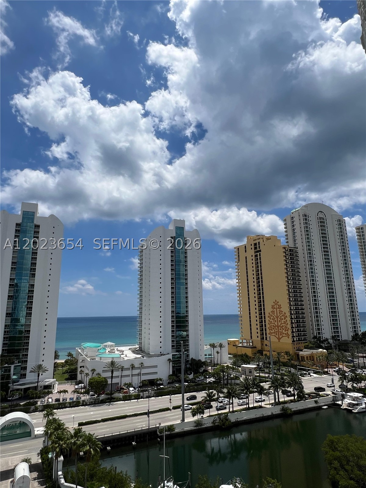 Beautiful 2-bedroom plus den, 2-bath unit facing the canal, with spectacular canal and ocean views. The unit is very well maintained and features several upgrades, granite countertops, and new stainless steel appliances. Enjoy the beach club with beach service, restaurant, fitness center, spa, and much more!! Just reduced best opportunity!!!