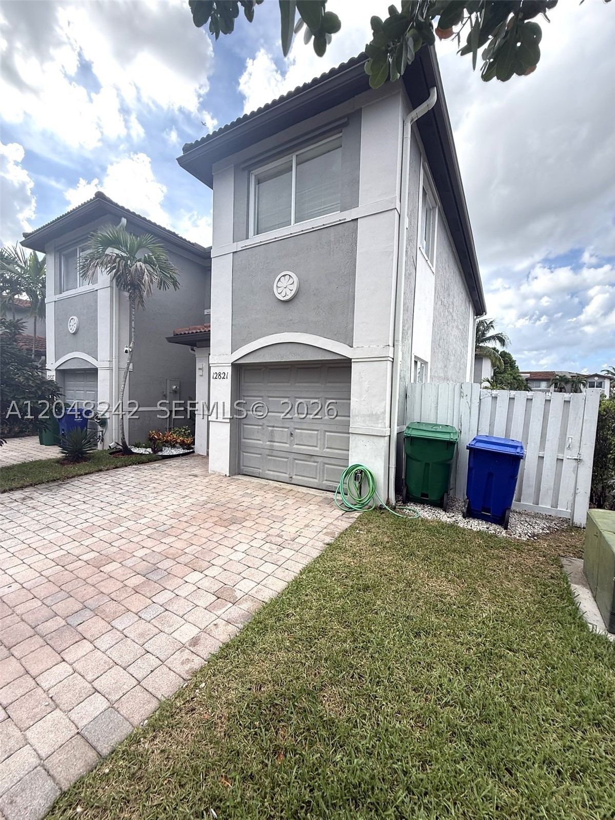 Welcome to this beautifully renovated corner-unit townhouse located in the highly desirable gated community of Harbour Lakes at Monarch Lakes. This spacious home offers 3 bedrooms, 2.5 bathrooms, a one-car garage, a private balcony, and a large fenced backyard designed for entertaining, relaxing, and enjoying the South Florida lifestyle.

Step inside to a bright, modern interior featuring stylish vinyl and tile flooring throughout, beautifully updated bathrooms, and thoughtfully renovated living spaces. The corner-unit location provides additional privacy and natural light, while the oversized backyard offers plenty of room for outdoor dining, gatherings, children’s play, or creating your own private retreat.

Harbour Lakes at Monarch Lakes offers excellent community amenities, including a swimming pool and children’s park. The property is conveniently located near highly rated schools, Miramar Town Center, shopping, dining, entertainment, and the exciting new Miramar Cove development.

Commuters will appreciate the easy access to I-75 and Florida’s Turnpike, providing convenient travel throughout Broward and Miami-Dade counties.

Completely renovated, move-in ready, and ideally located, this exceptional townhouse combines modern design, generous outdoor space, privacy, and community amenities. A must-see opportunity in Harbour Lakes at Monarch Lakes.