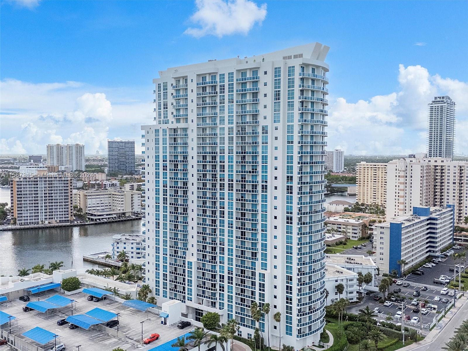 Reduced again for quick sale! *LOWEST PRICED 2 BEDROOM  IN THE BUILDING !! BEST OPEN LAYOUT AND AMAZING OCEAN,INTRACOASTAL & CITY VIEWS FROM THIS HIGH FLOOR. 2 LARGE  BEDROOMS W ON_SUITE BATHROOMS AND LARGE WALK-IN CLOSETS + 1/2 BATH FOR GUESTS. CEILING TO FLOOR WINDOWS,9FT CEILINGS, UPGRADED KITCHEN, W/ KITCHEN ISLAND,STAINLESS STEEL APPLIANCES,GRANITE COUNTERTOPS.  LARGE WALKIN CLOSETS, IMPACT FLOOR TO CEILING GLASS WINDOWS. AMENITIES INCLUDE WATERFRONT POOL, SPA, FITNESS CENTER, STORAGE ROOM, 48 BOAT-SLIPS, CONFERENCE & RECREATION ROOMS,BILLIARD ROOM, ACROSS THE STREET FROM OCEAN, CLOSE TO GULFSTREAM CASINO,, SHOPPING , AND RESTAURANTS!