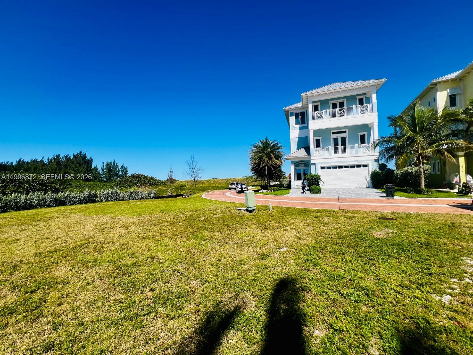 2,613 sqft Ocean View Lot with customs plans in desirable Oceanfront Community on desirable Hutchinson Island. Build your dream home in this private gated enclave of custom built Key West style homes. Watersong is a beautiful intimate neighborhood featuring brick paver roads and a community swimming pool.
