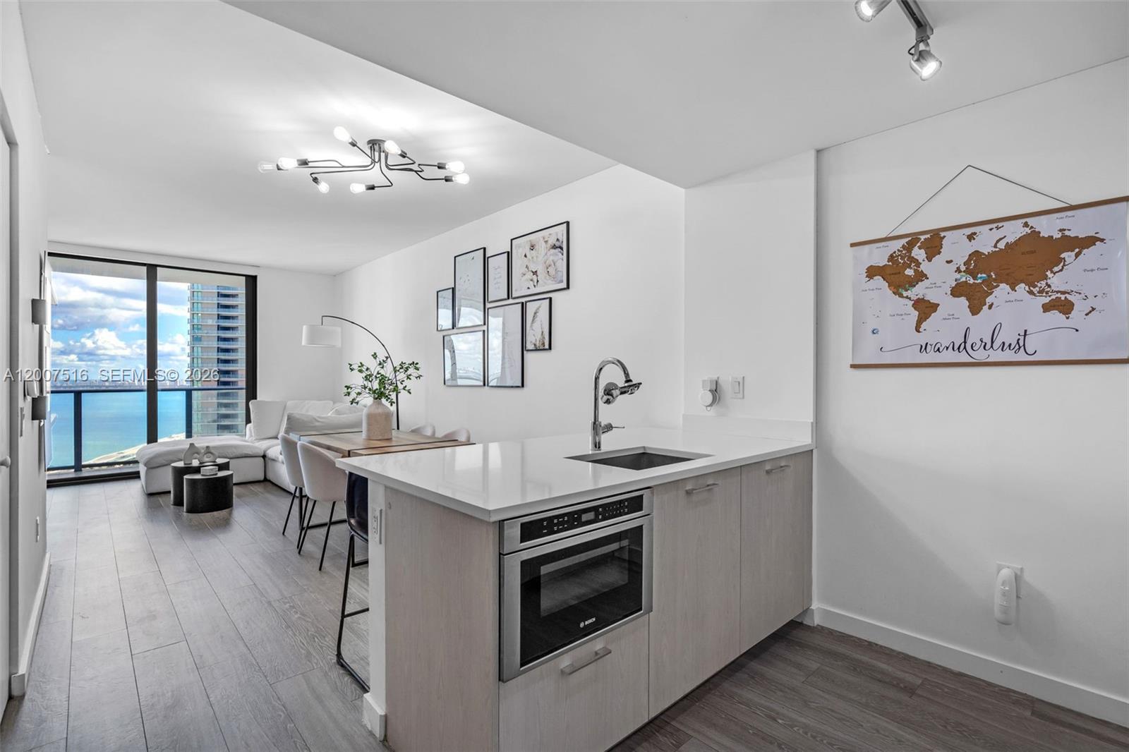 This Edgewater luxurious waterfront condo offers breathtaking panoramic views of Biscayne Bay and the Miami skyline from the 37th floor. Modern design with floor-to-ceiling windows, Open-concept layout with high-end stainless steel appliances. The unit also includes NEW 2026 In-unit Laundry installed June. Amenities include: Rooftop pool with 360-degree views of Miami, Resort-style pool and hot tub, Tennis Courts, fitness center, Spa with sauna and private massage room, On-site restaurant, lounge, and game room, 24-hour concierge and valet services. Located minutes from Wynwood, the Design District, and Downtown Miami, and Miami Beach