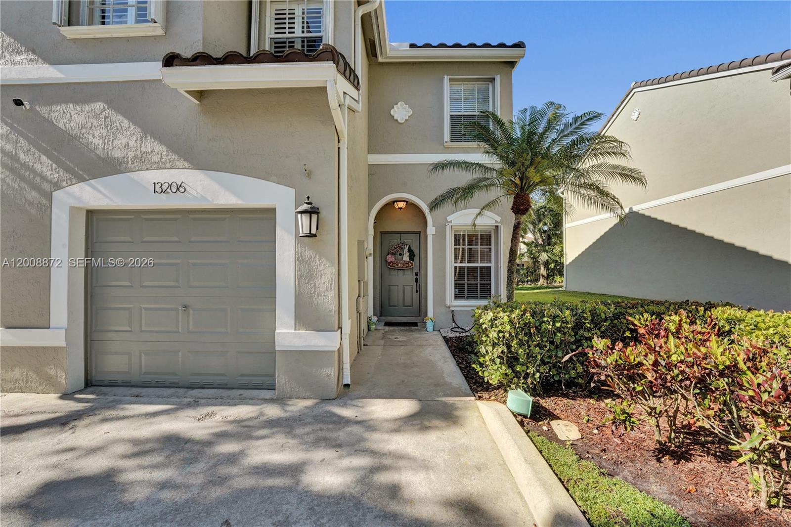Spacious 3 bedroom 2.5 bath Corner home with 1 car attached garage in the charming community of Plantation Trace. This bright and spacious townhome has an open concept, beautifully designed plan. Features include Gourmet kitchen with Wood Cabinets and granite counters.  Stainless Appliances (2023) exterior ac handler (2025), water heater (2021), travertine tile throughout the downstairs, laminate on stairs and upstairs. All bedrooms upstairs. Spacious primary bed has large walk-in closet, Primary bath has been updated with dual sinks, soaking tub and separate shower. other features include: new roof (2025) accordion hurricane protection, entertainment area with wine cooler, all baths remodeled, full sized washer/dryer, updating plumbing & light fixtures and ceiling fans.  Unit backs up to beautiful water and golf course view which you can  enjoy on your back patio. Attached garage with 2 car driveway.  Plantation Trace has community pool and tot lot. It is perfectly located 
within a short distance of Sawgrass Elementary, as well as Flamingo Park with covered outdoor basketball courts, baseball and soccer fields, a splash pad, and a pathway. Located near Sawgrass Expressway, I-75, and I-595 for easy commute in any direction. Only 20-25 min. drive to FLL International Airport and beaches. Close to Sawgrass mall w/dining and shopping options. Low Assoc fees. No credit or income requirements