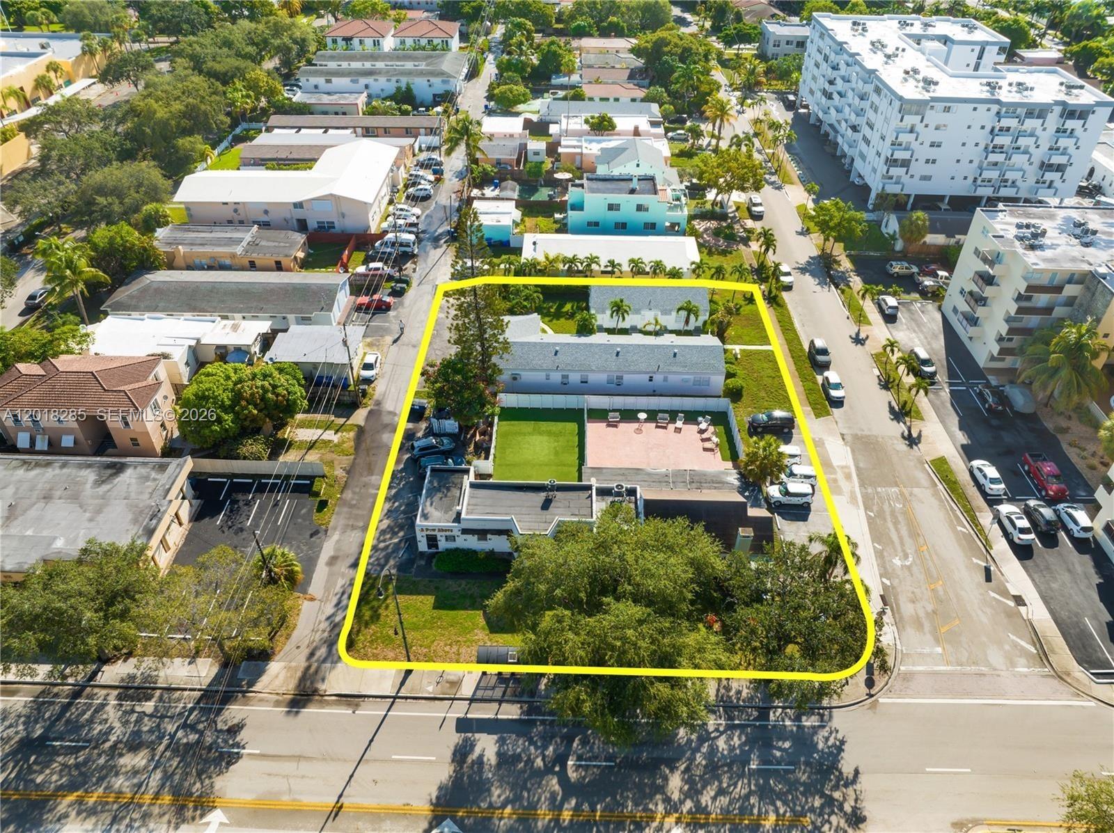 Rare assembled corner site — 25,173 SF across 3 folios at the intersection of US-1 and Jefferson Street in Downtown Hollywood's Regional Activity Center. Zoned FH-2 mixed-use: build up to 18 stories / 190 ft with FAR 4.75, allowing up to 119,572 SF of residential, hotel, retail, office, or mixed-use development. Land prices at approximately $29/buildable SF at maximum density — among the most compelling bases in Broward County today. Two-parcel configuration: front parcel on Federal Highway is completely vacant and development-ready. Rear parcel at 1745 Jefferson generates $100K+ net annually from 6 fully furnished Airbnb units (5×1BR, 1×2BR) at 90% occupancy — income in place while you permit. 14 assigned parking spaces, 7 individual utility meters, no flood zone designation, effectively debt-free. The most difficult entitlement hurdle has already been cleared for a 5-story, 51-unit residential concept — buyer benefits from advanced approvals. Previously listed by Douglas Elliman at $4,990,000. Now offered at $3,500,000. Seller financing may be available for qualified buyers. Surrounded by $1B+ in active development: 1818 Park ($190M, Aug 2025), 21 Hollywood (under construction), Gaia Residences ($850–$1,069/SF pre-sales). Downtown Hollywood Opportunity Zone. All information for reference only — verify all zoning, FAR, height, and entitlement details with City of Hollywood Planning Department.