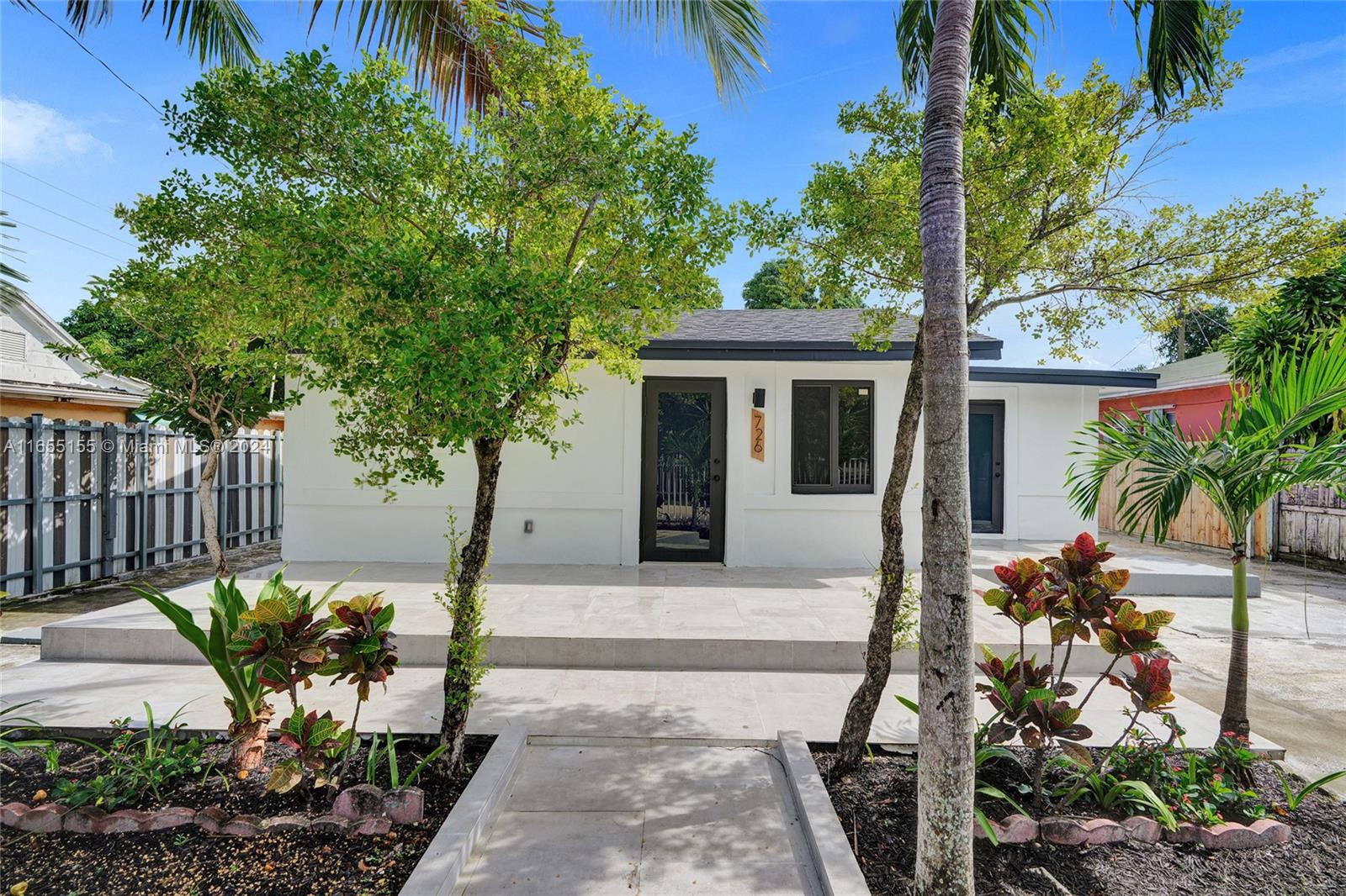 This completely remodeled 3 bedroom and 2 bathroom home offers the perfect blend of luxury and comfort with modern finishes. The bright, open-concept kitchen features elegant 2 tone shaker cabinets, farmhouse sink, brand-new stainless steel appliances, and sleek quartz countertops. The entire property boasts a fresh, contemporary look, with a new roof, new iron fence & gates, impact doors/windows, new vinyl plank flooring—everything is brand new and move-in ready. Enjoy freshly painted interior and exterior walls, upgraded bathrooms with porcelain tiles, quartz countertops, and recess lighting in the entire home for modern living. Call for details. Don’t miss out—schedule your showing today before this gem is gone!
