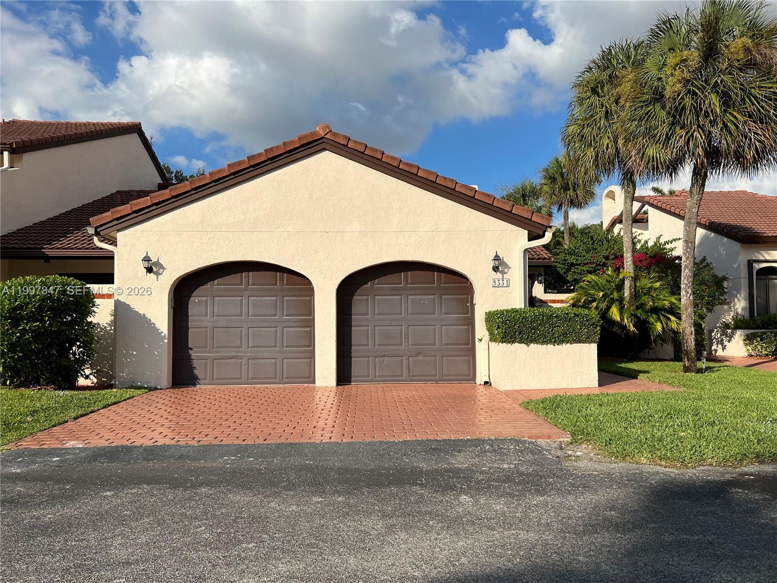 This home has been recently remodeled with fine appointments. This unique home has an amazing floor plan, and it is loaded with upgrades. Doral Colony is inside the prestigious Doral Estate community that is secluded inside the Trump Golf Course. Doral Colony is very secure with roaming patrol, and guard gated entrance. Come and take a look, this property will not last in the market too long.